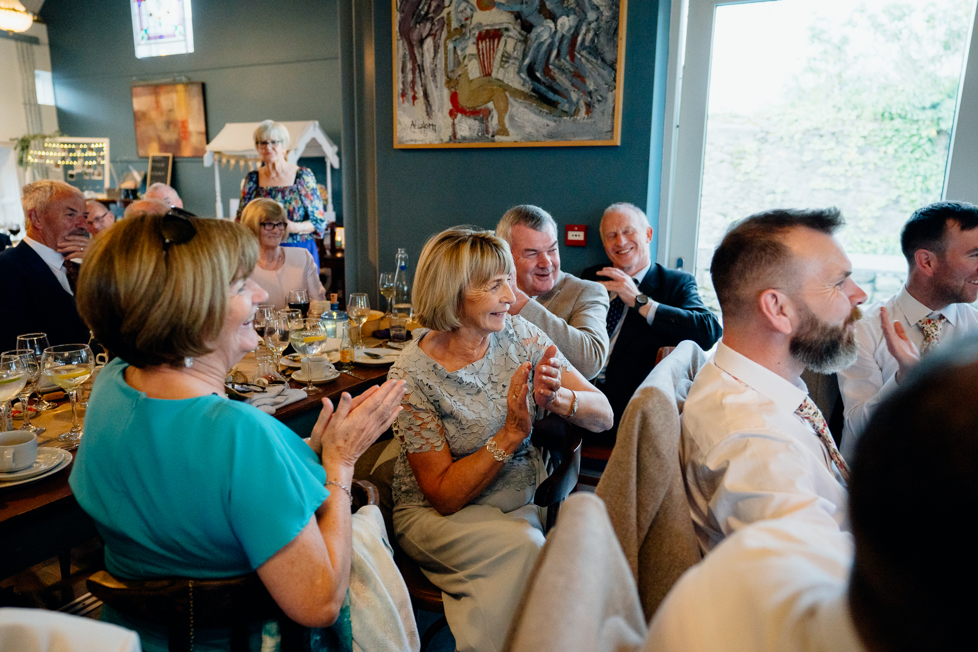 A group of people sitting at a table