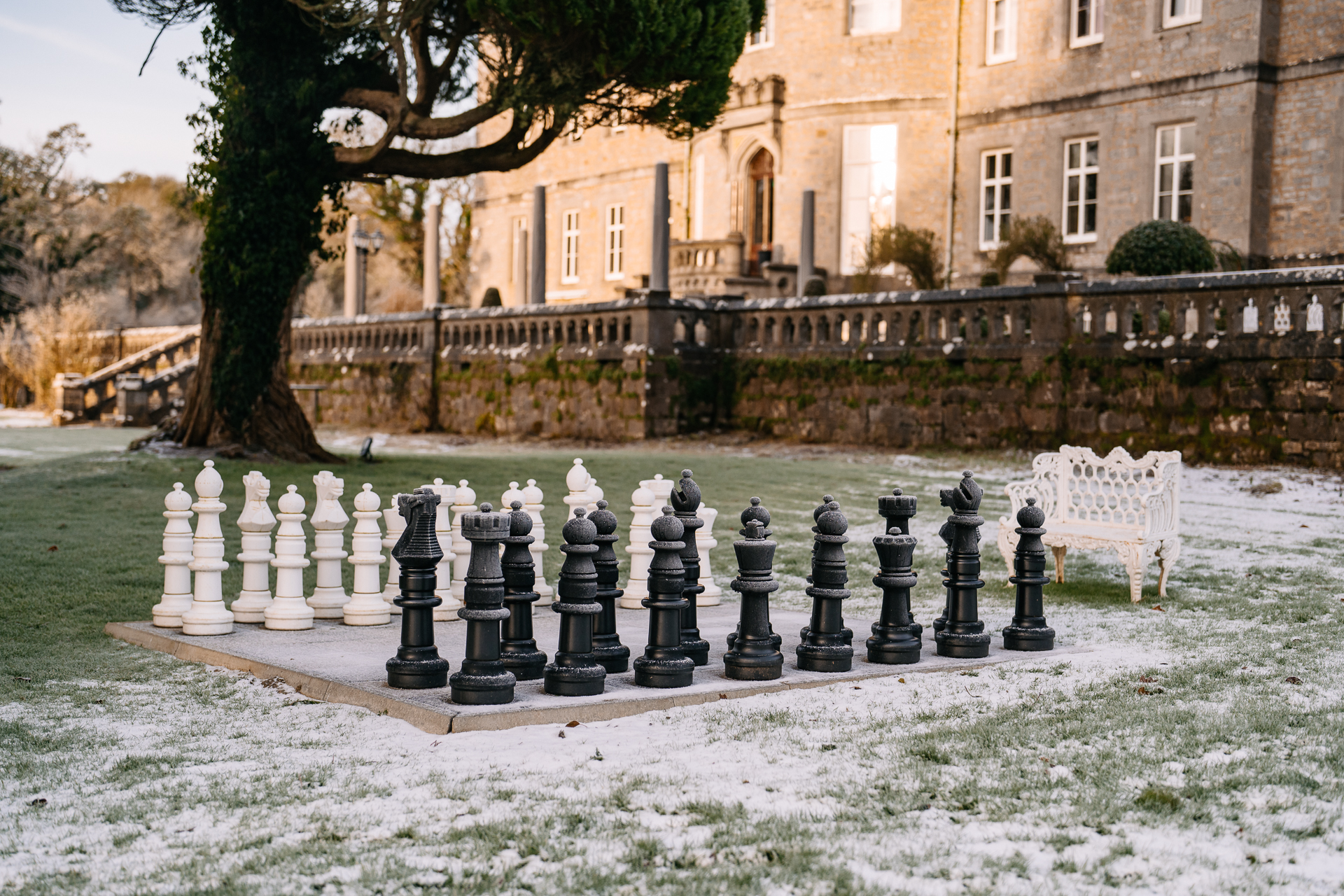 A chess board in front of a building