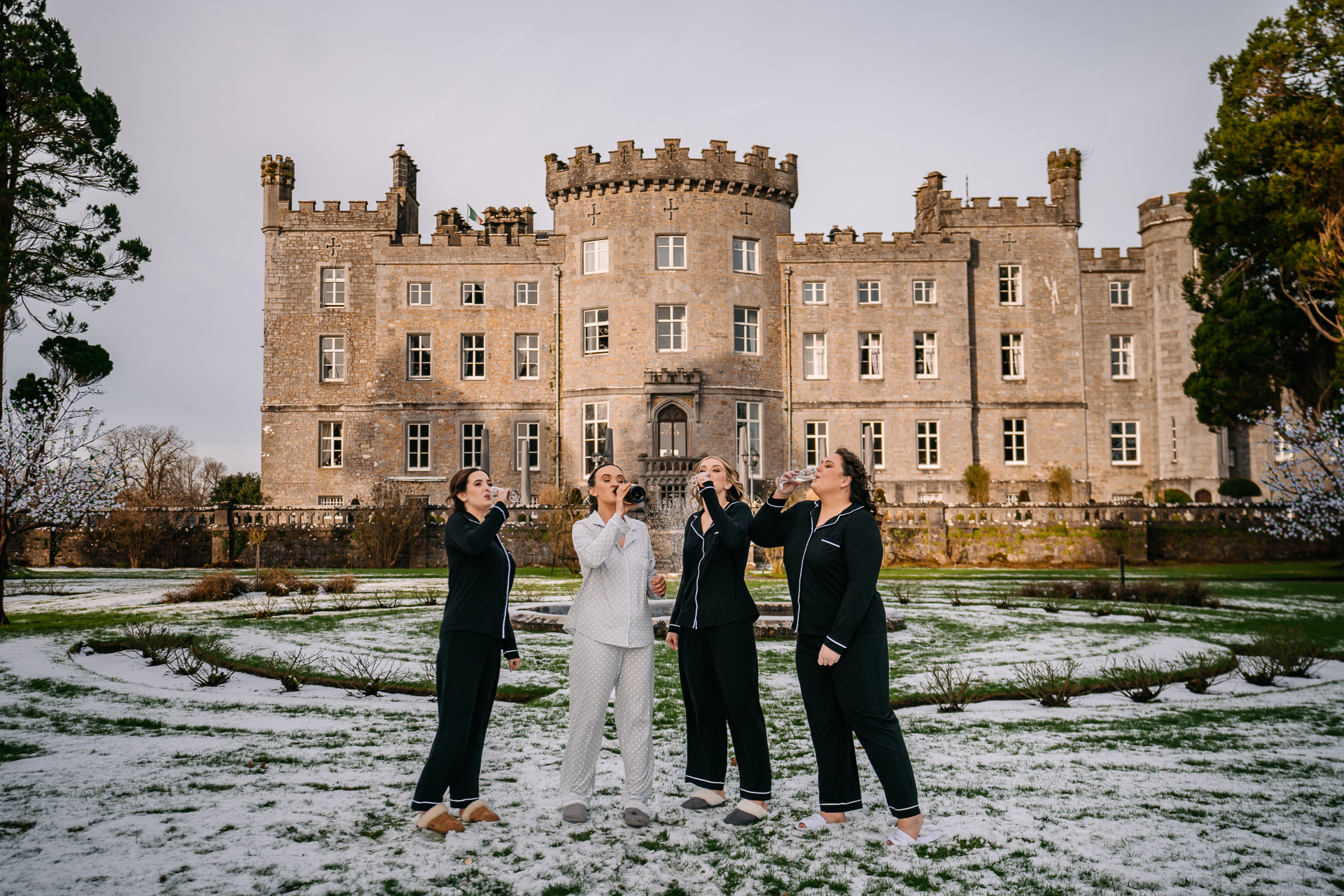 A group of people standing in front of a building