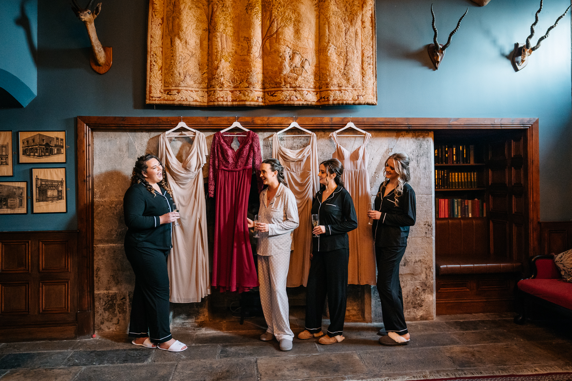 A group of people standing in front of a curtain