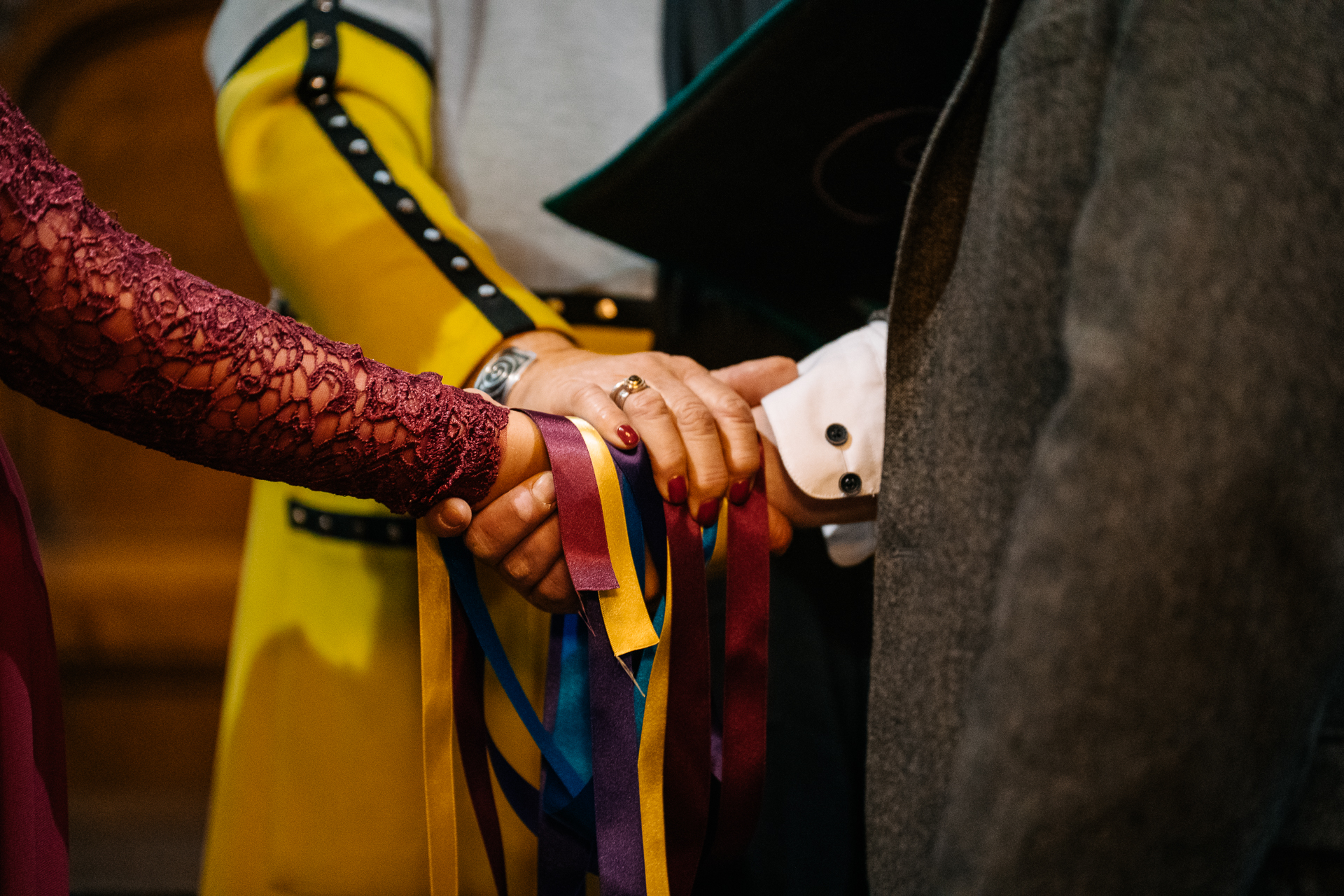 A person tying a tie