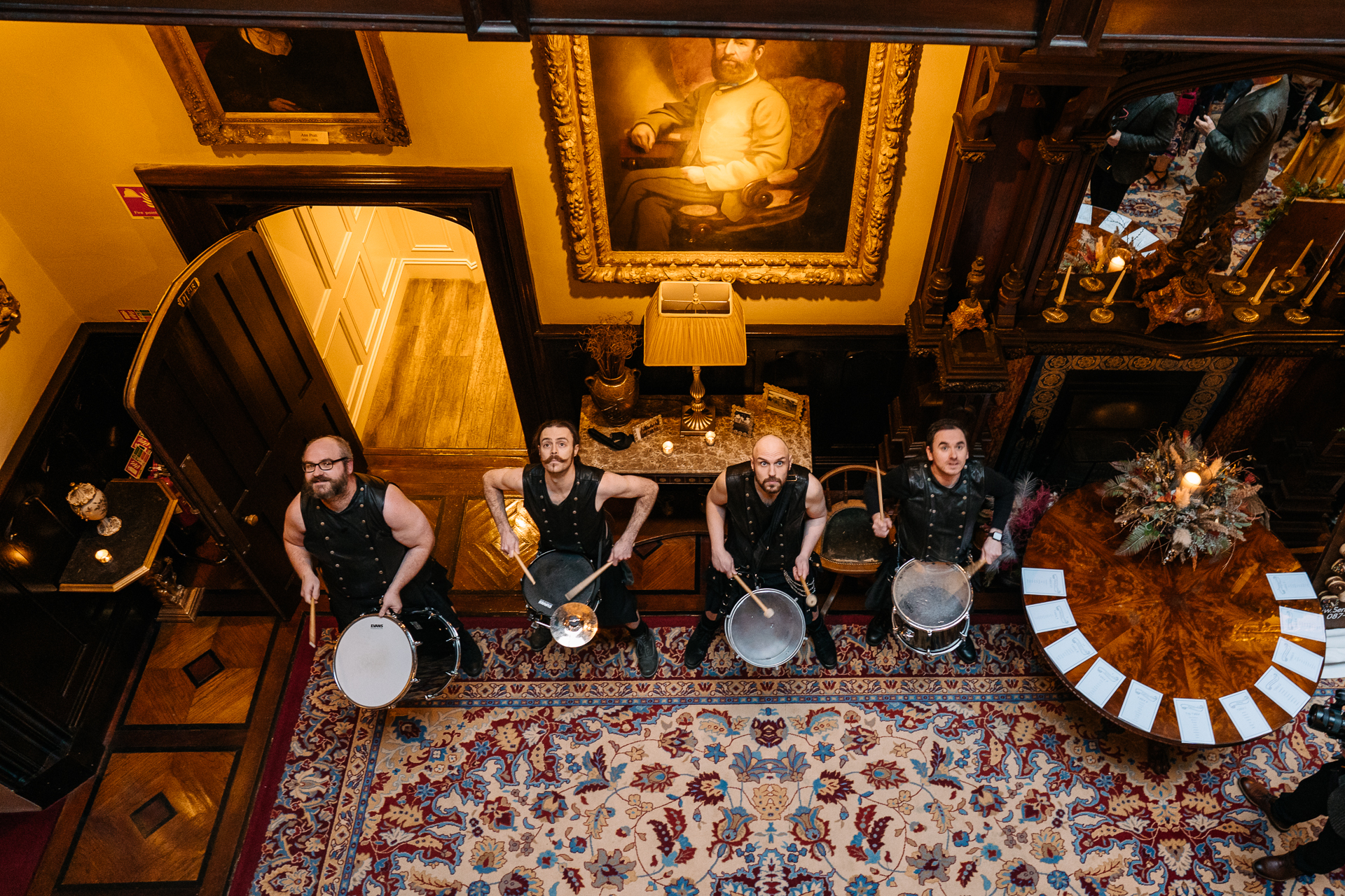 A group of men playing drums