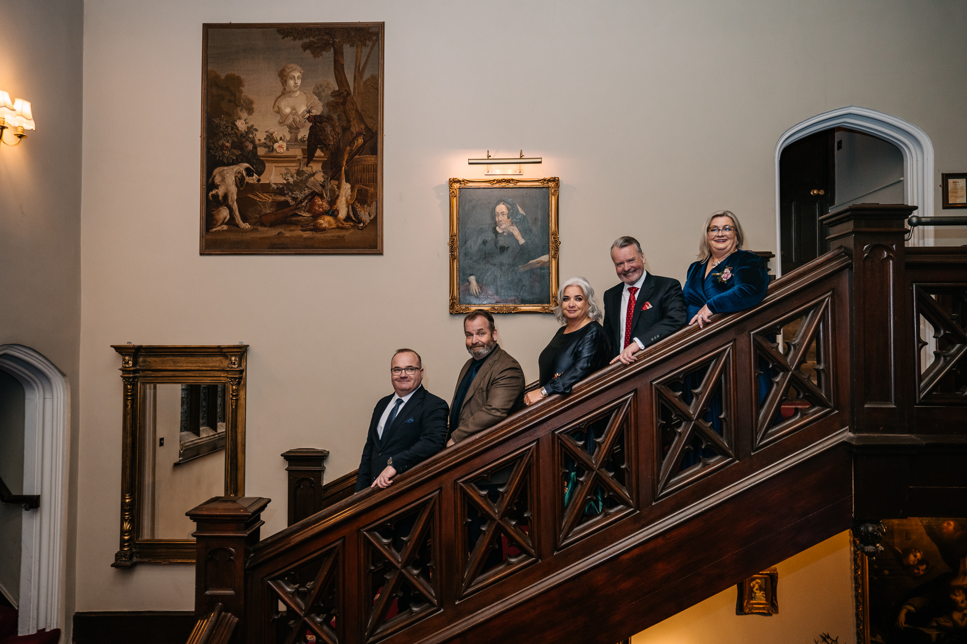 A group of people standing on a staircase