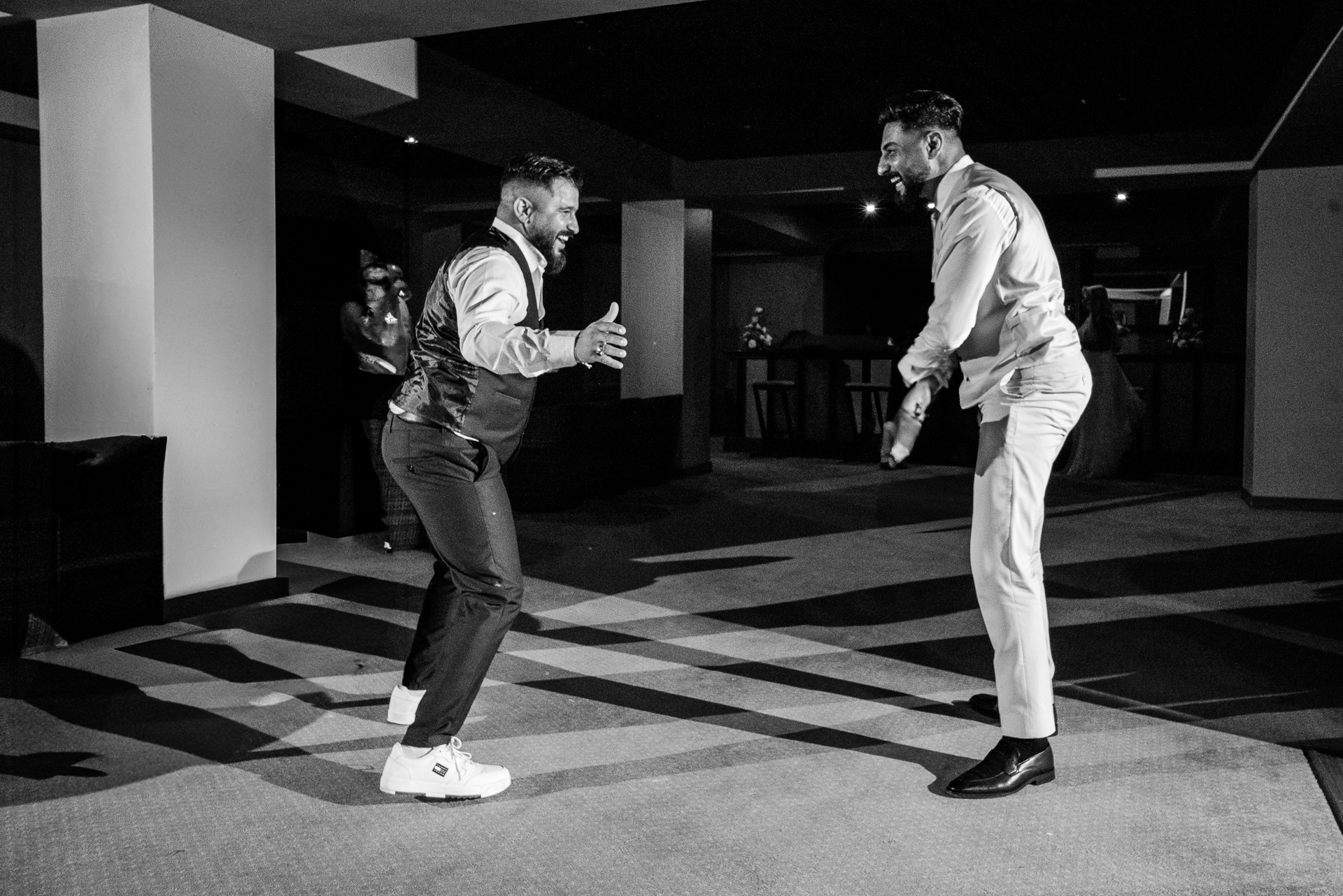 A couple of men dancing