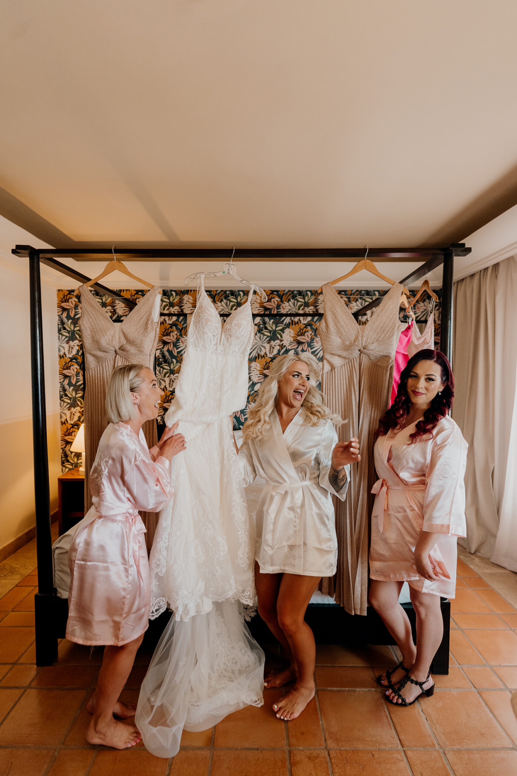 A group of women in white dresses