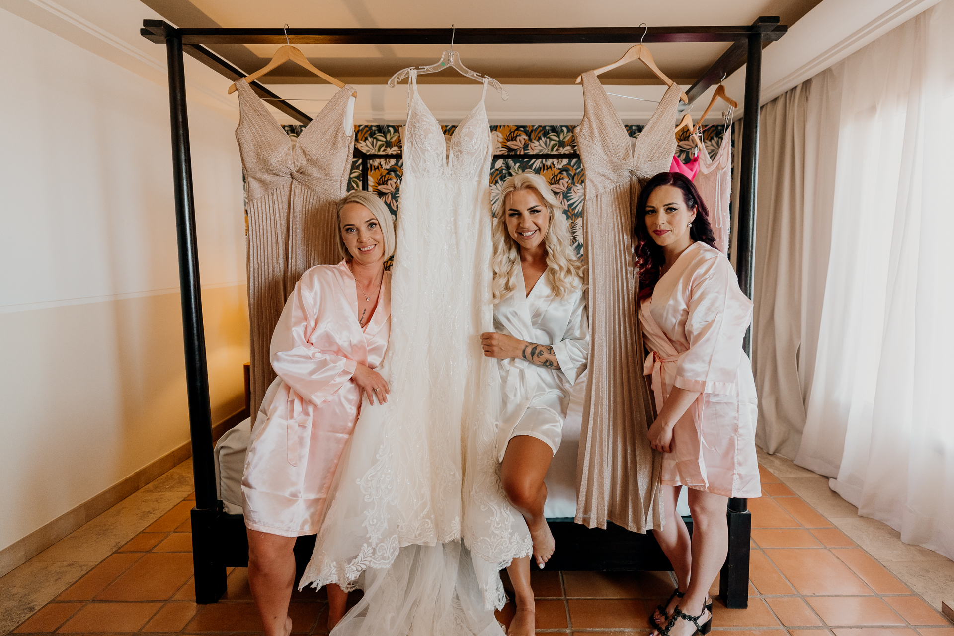 A group of women in white dresses