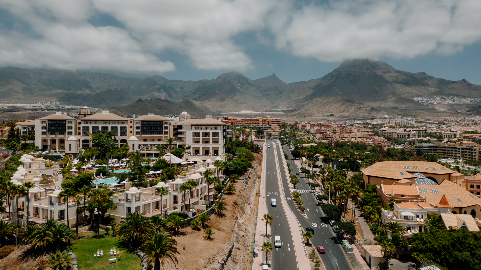 A city with a road and trees