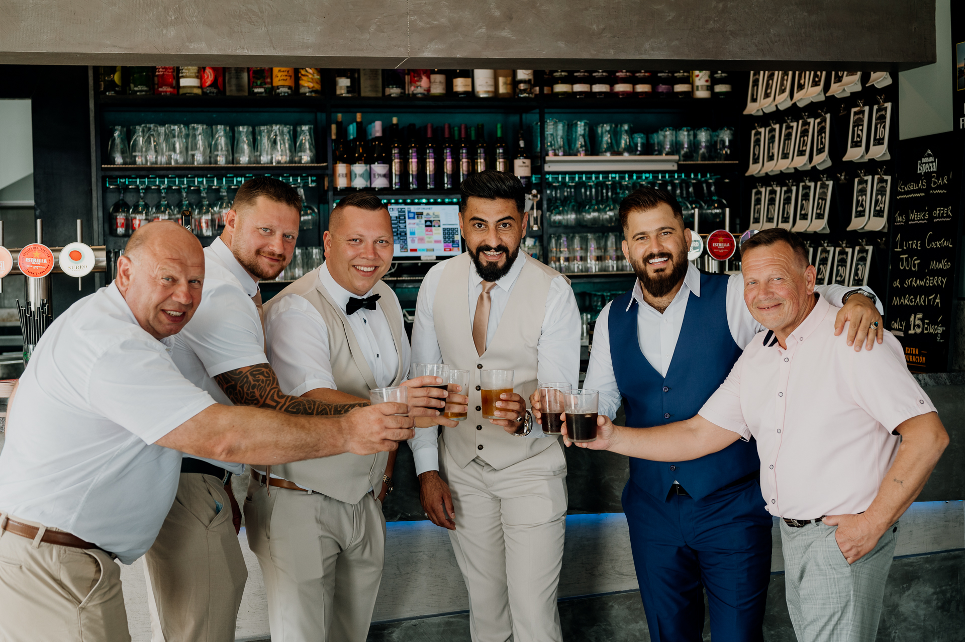 A group of men posing for a picture