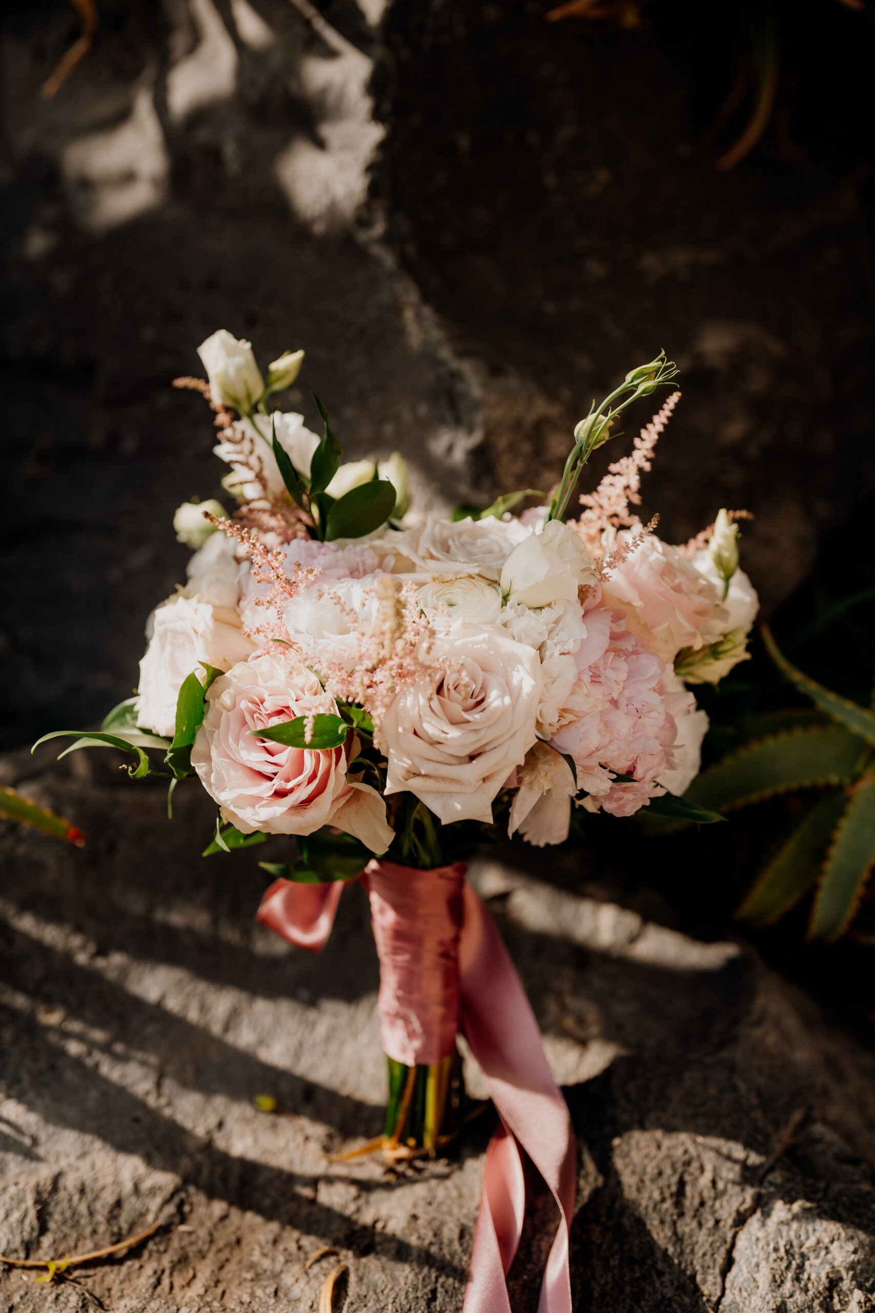 A person holding a bouquet of flowers