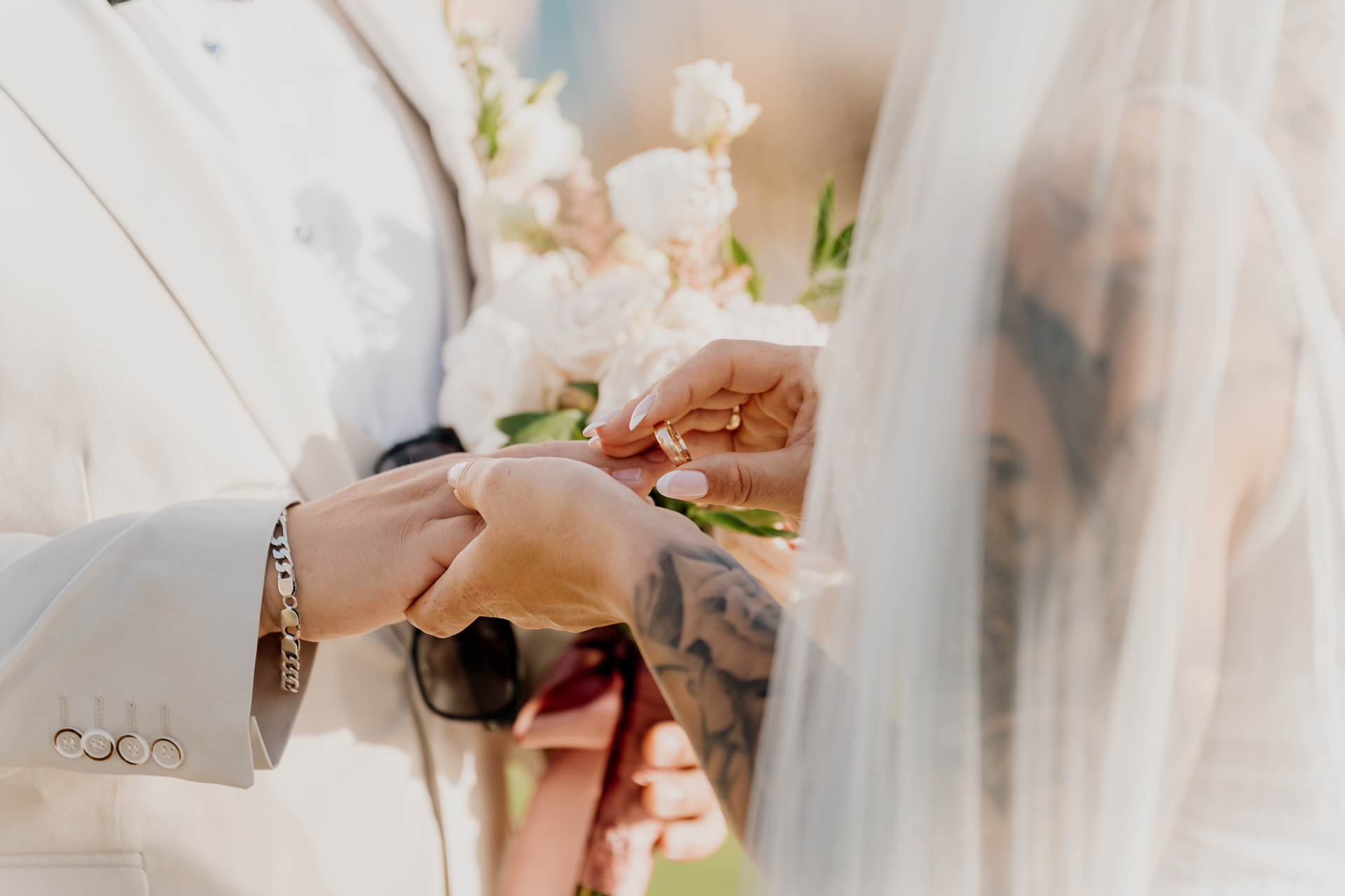 A person holding a bouquet of flowers