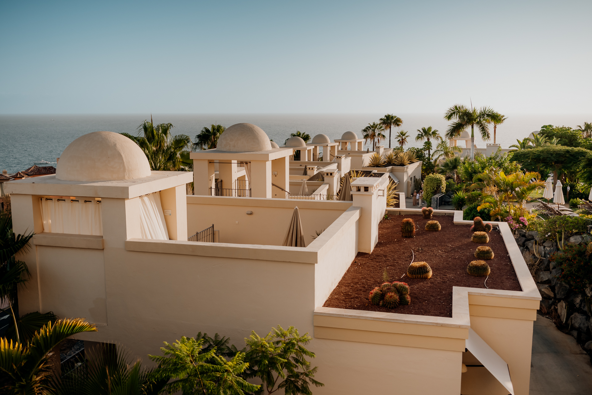 A building with a beach in the background