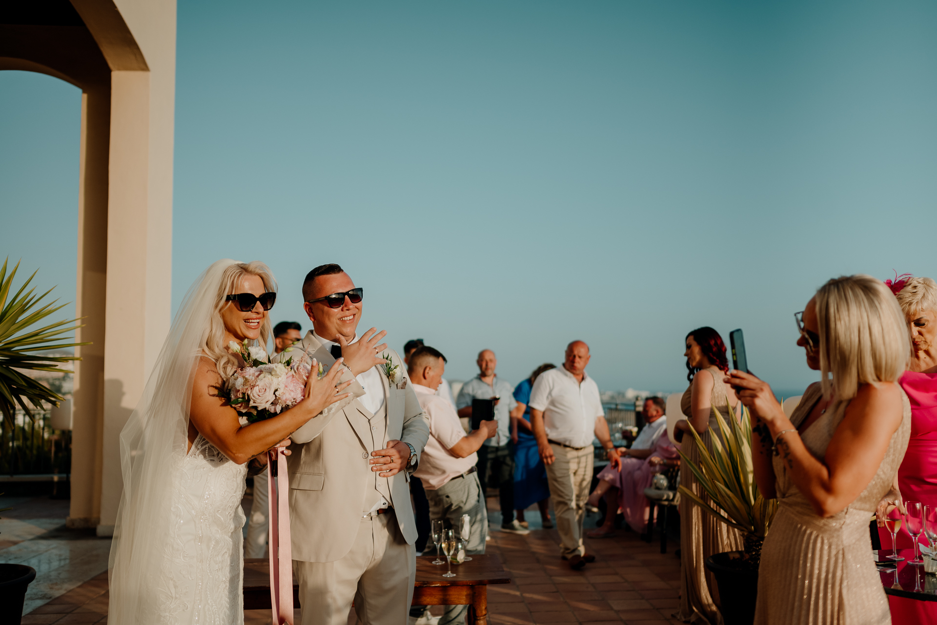 A man and woman holding hands