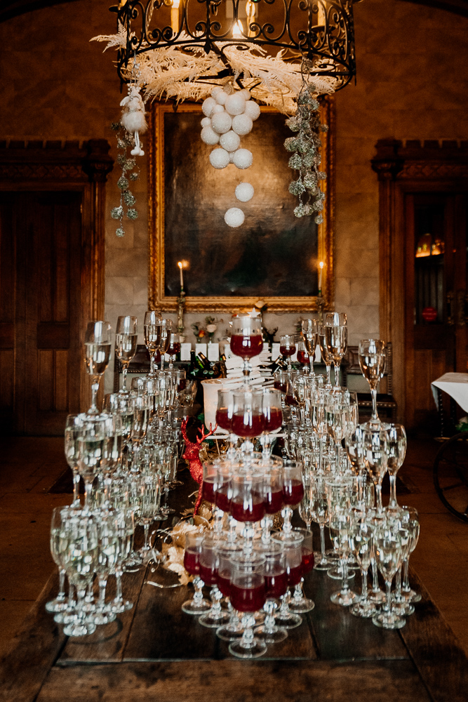 A table with a large group of wine glasses on it