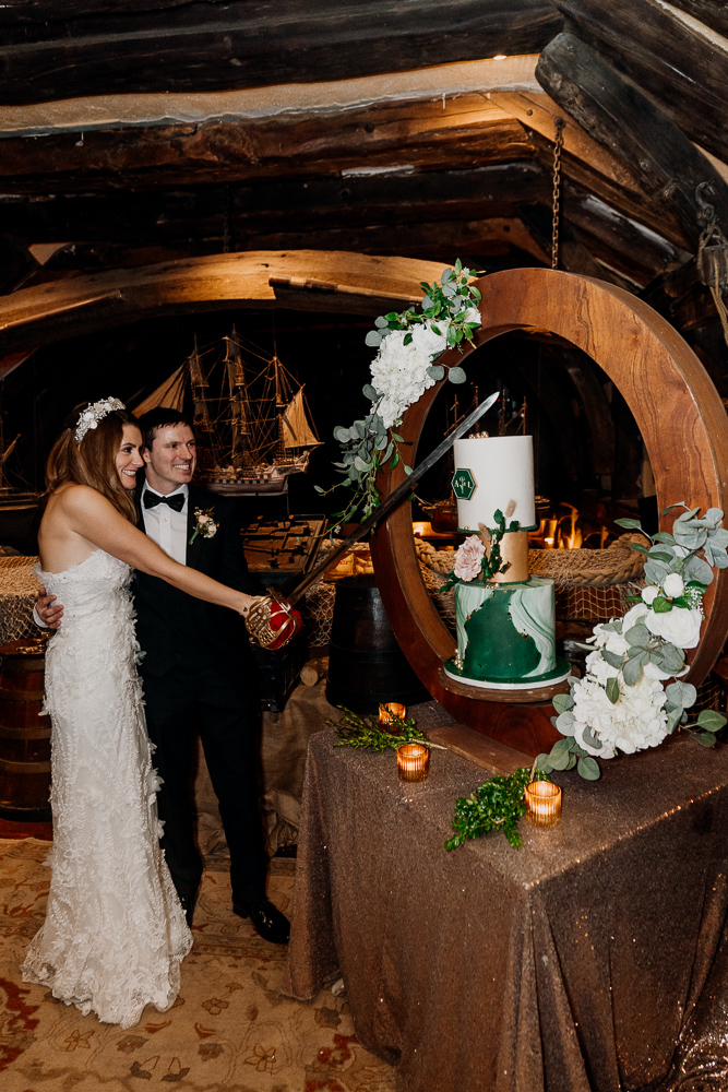 A bride and groom posing for a picture