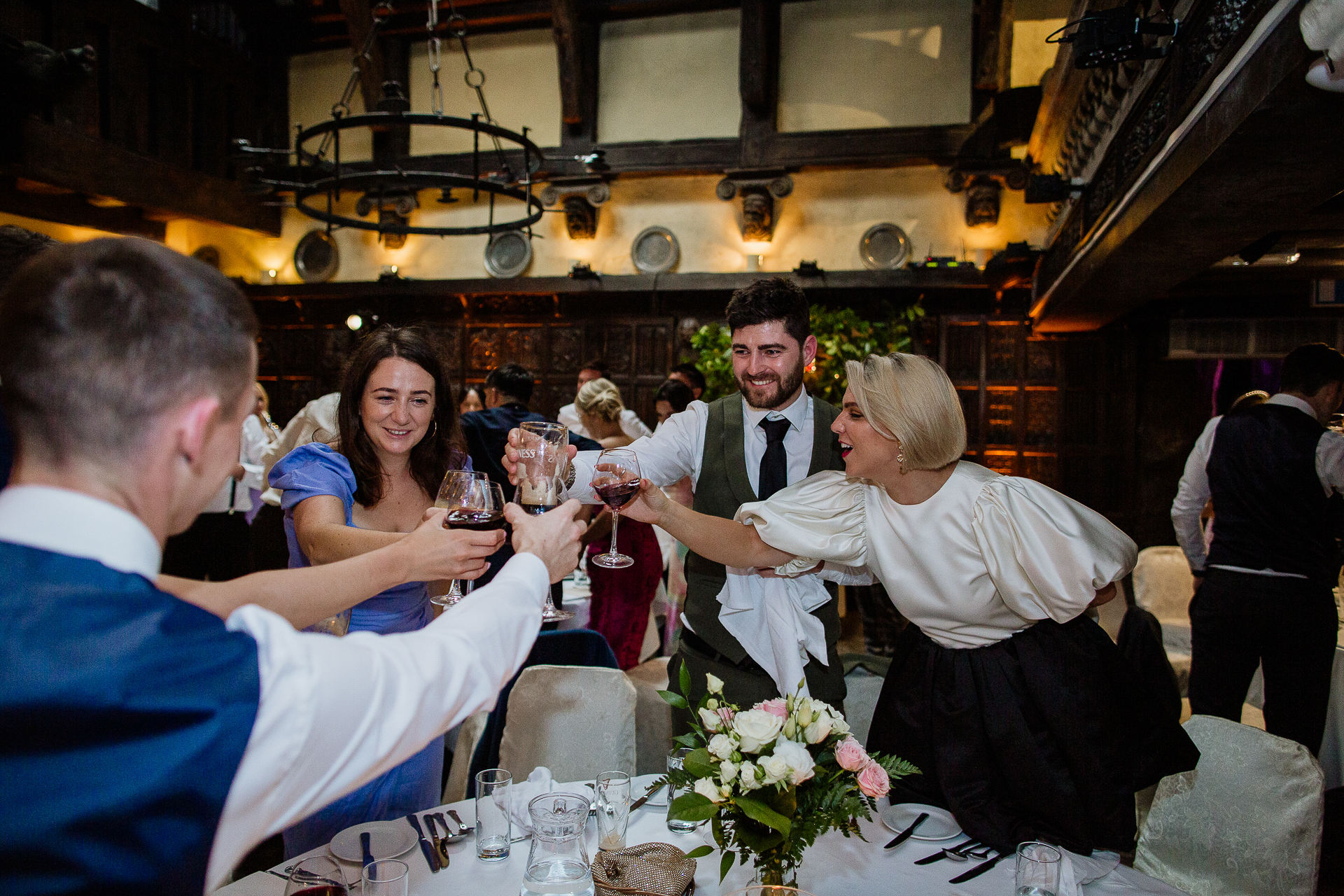 A group of people drinking wine