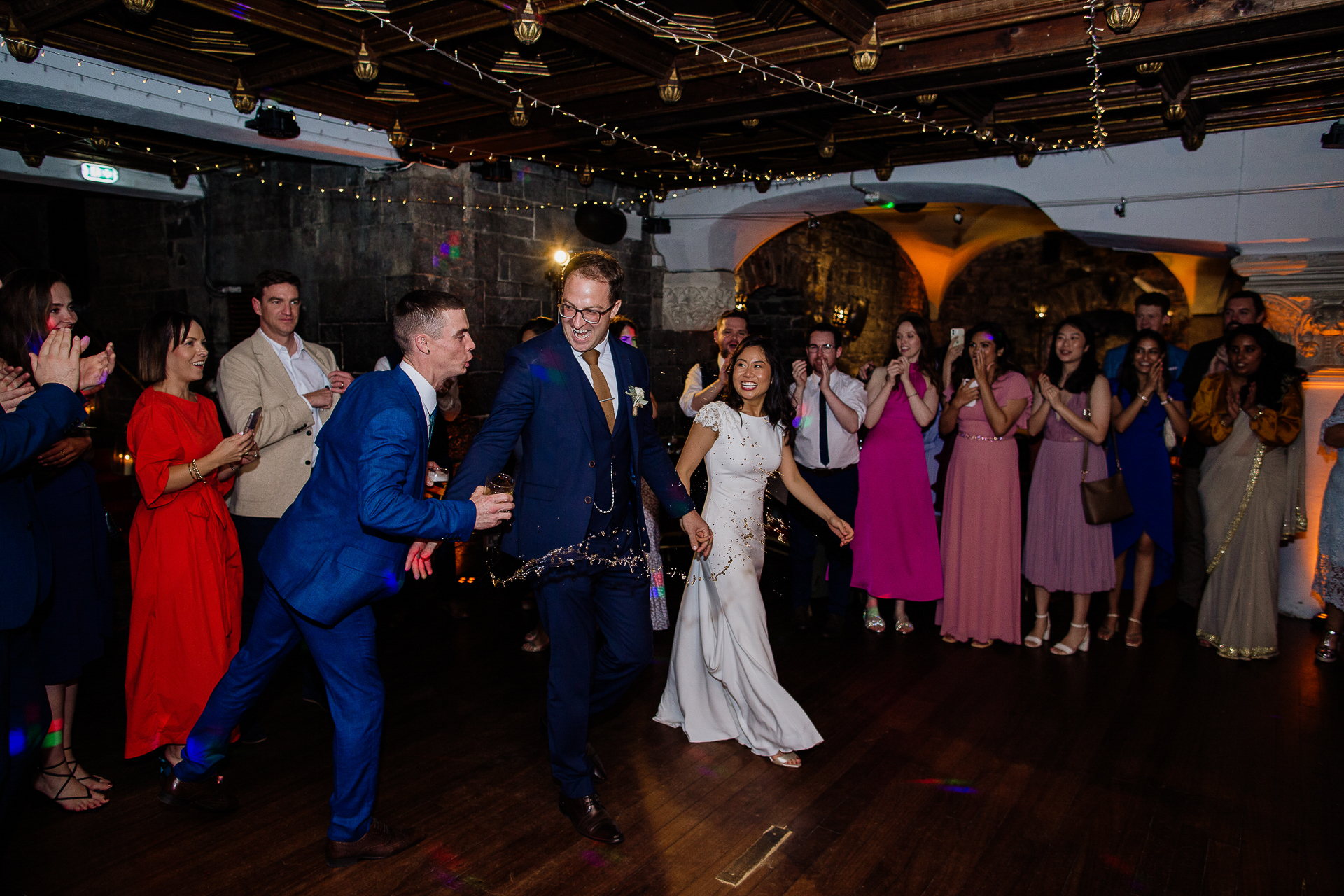 A man and woman dancing at a wedding reception