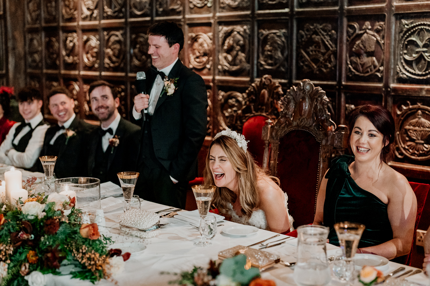 A group of people sitting at a table with drinks