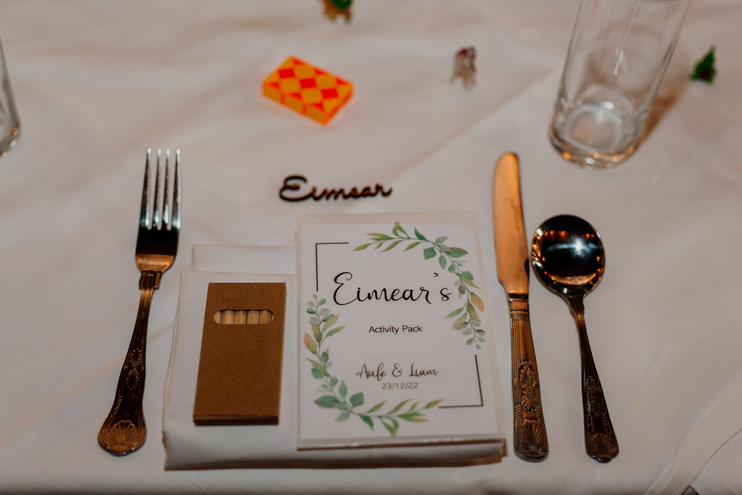 A table with silverware and a note