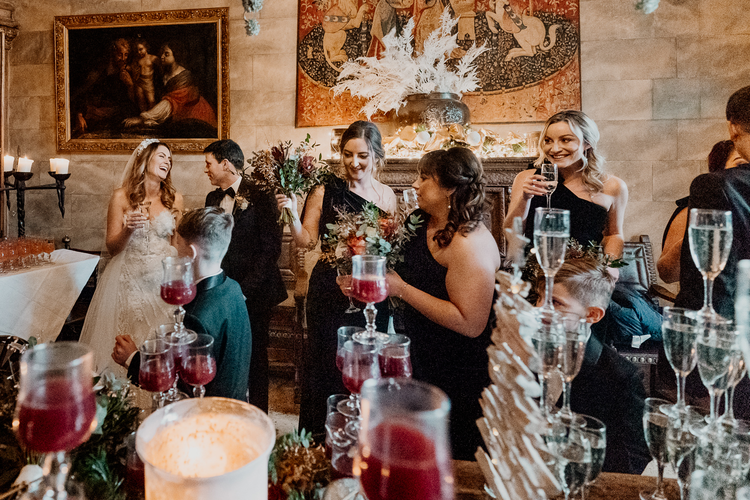 A group of people drinking wine