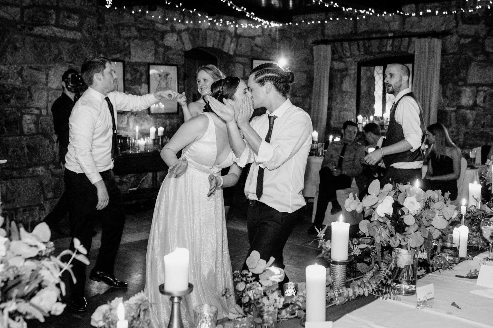 A bride and groom kissing