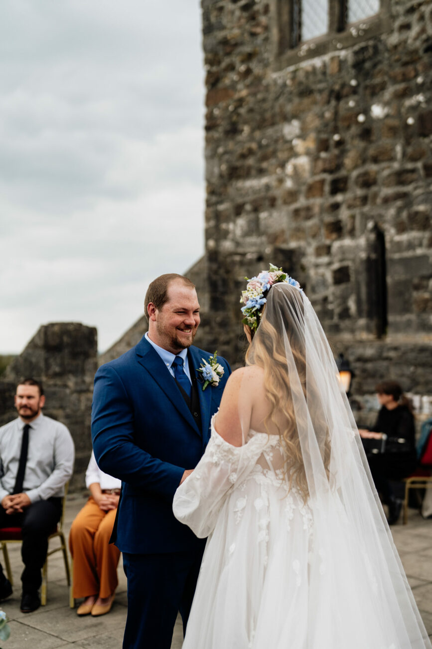 A man and woman in wedding attire