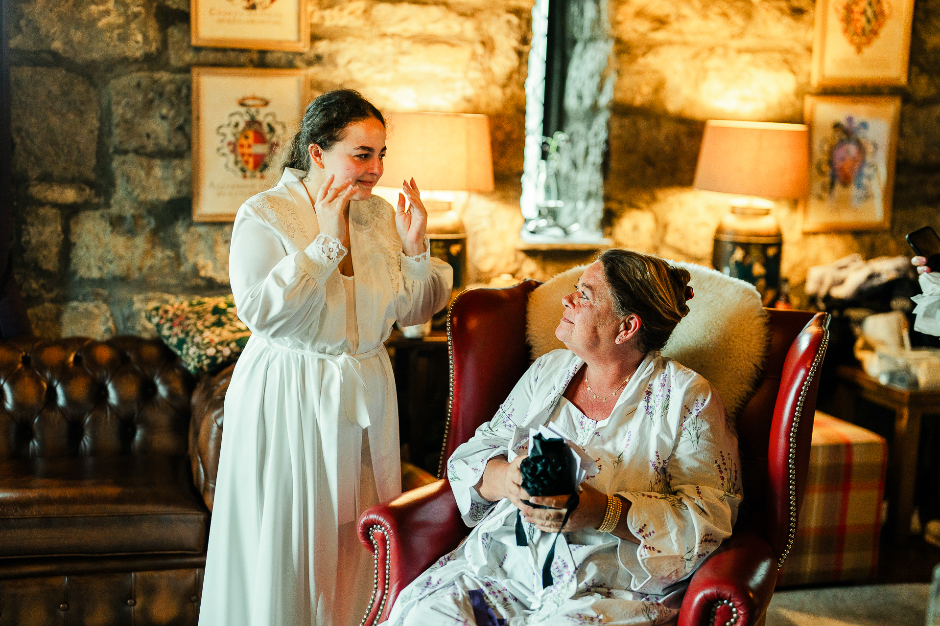 A man in a white robe and a woman in a white dress