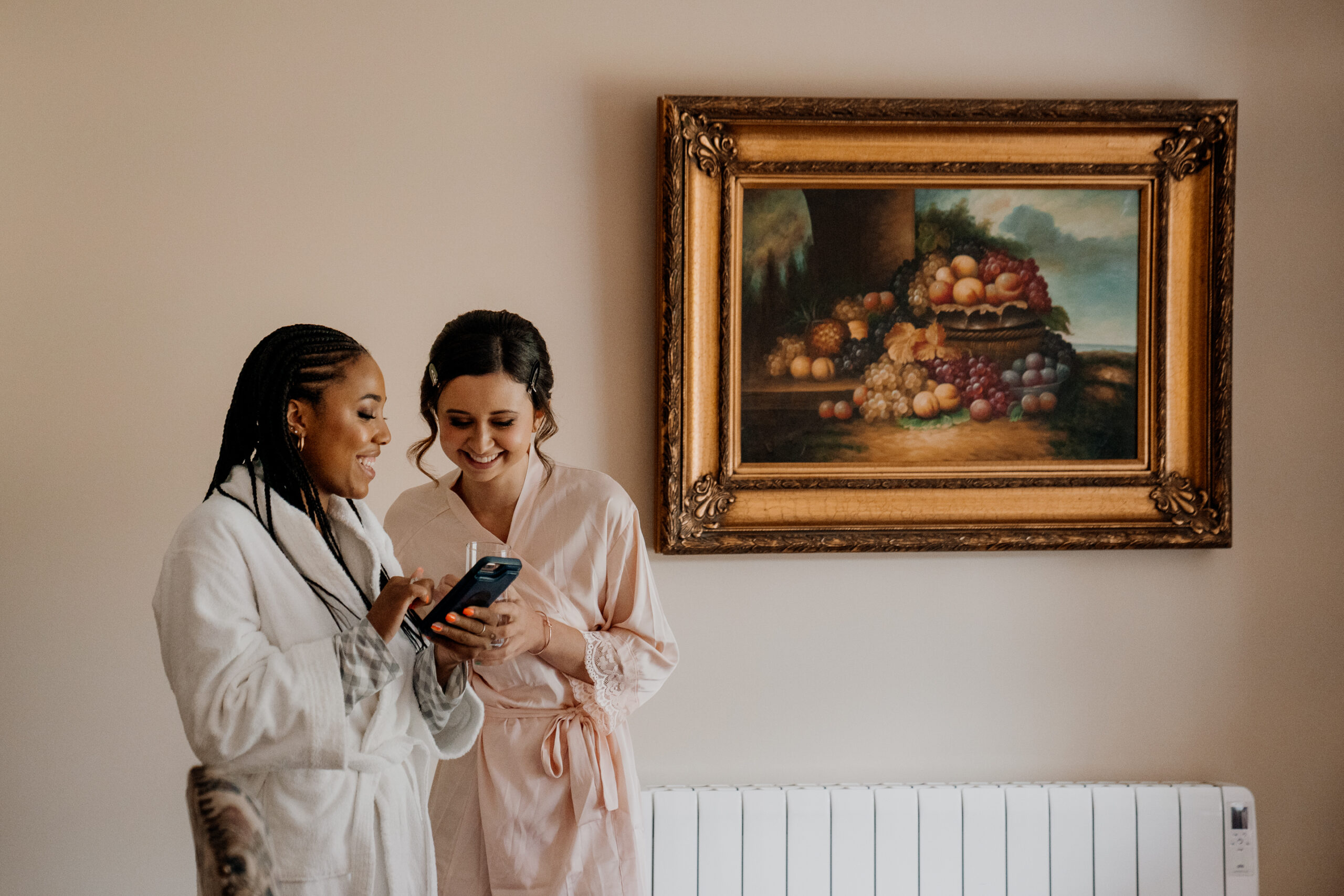 A couple of women in white robes