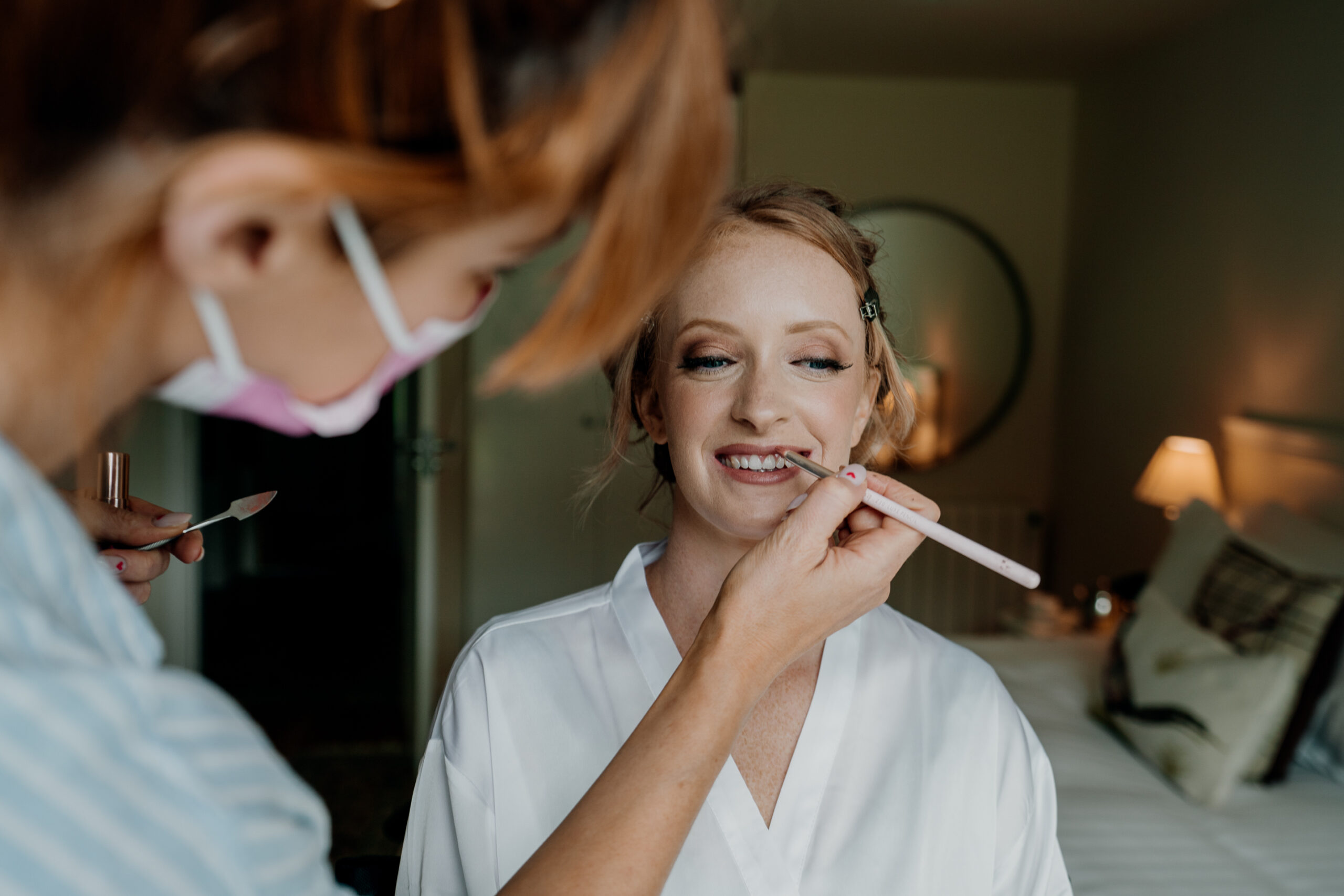 A person getting the teeth brushed