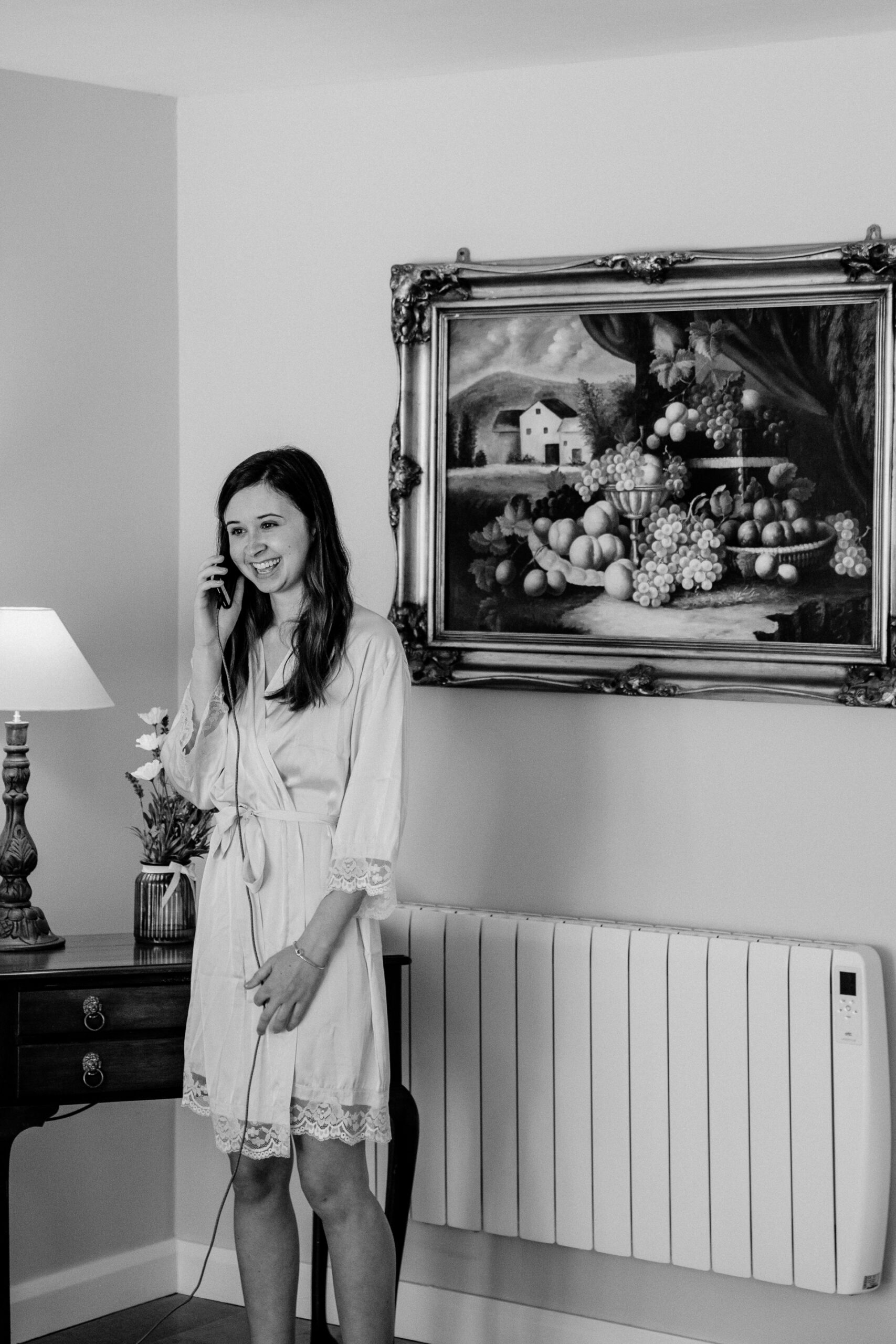 A woman standing in front of a mirror