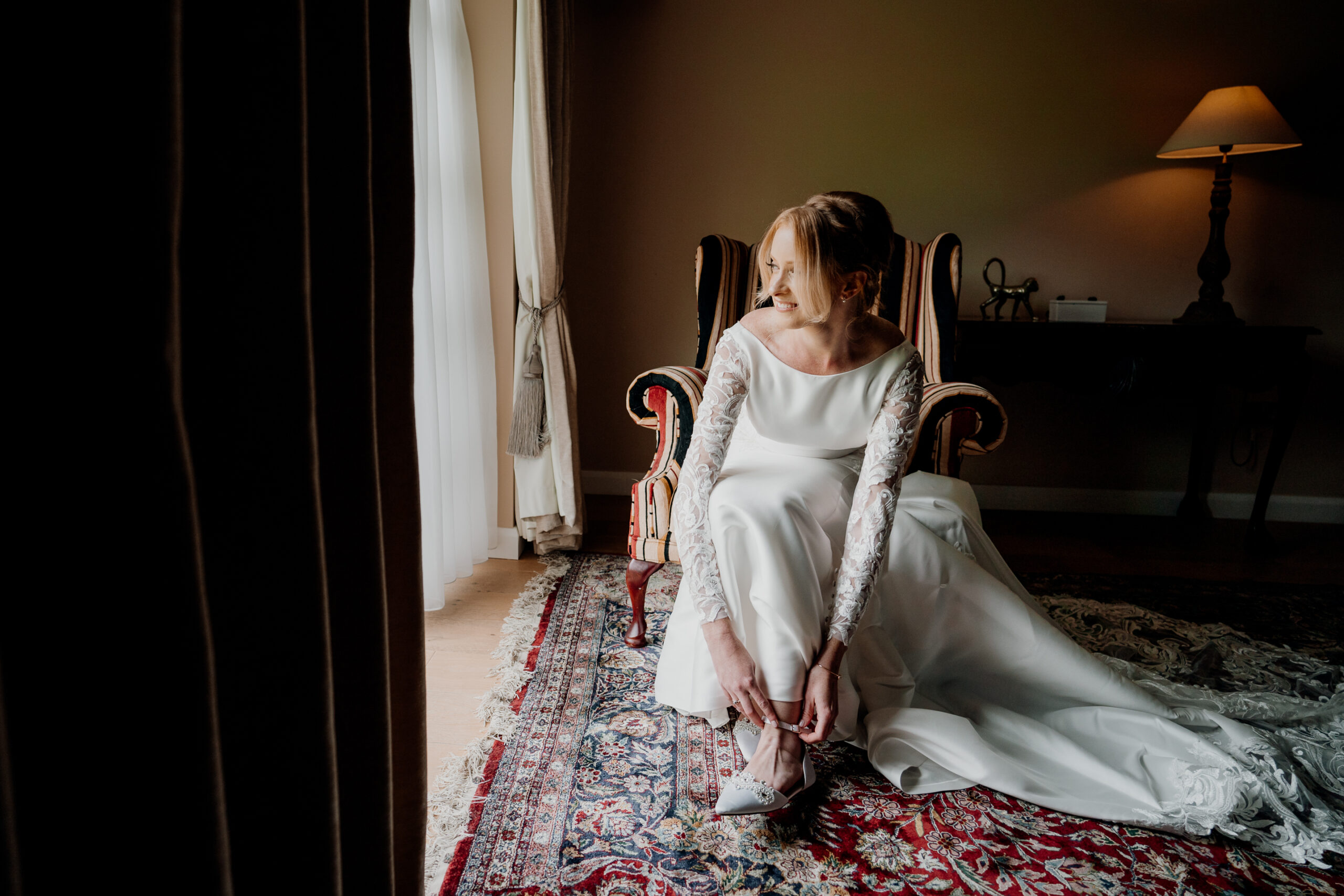 A person sitting on a bed