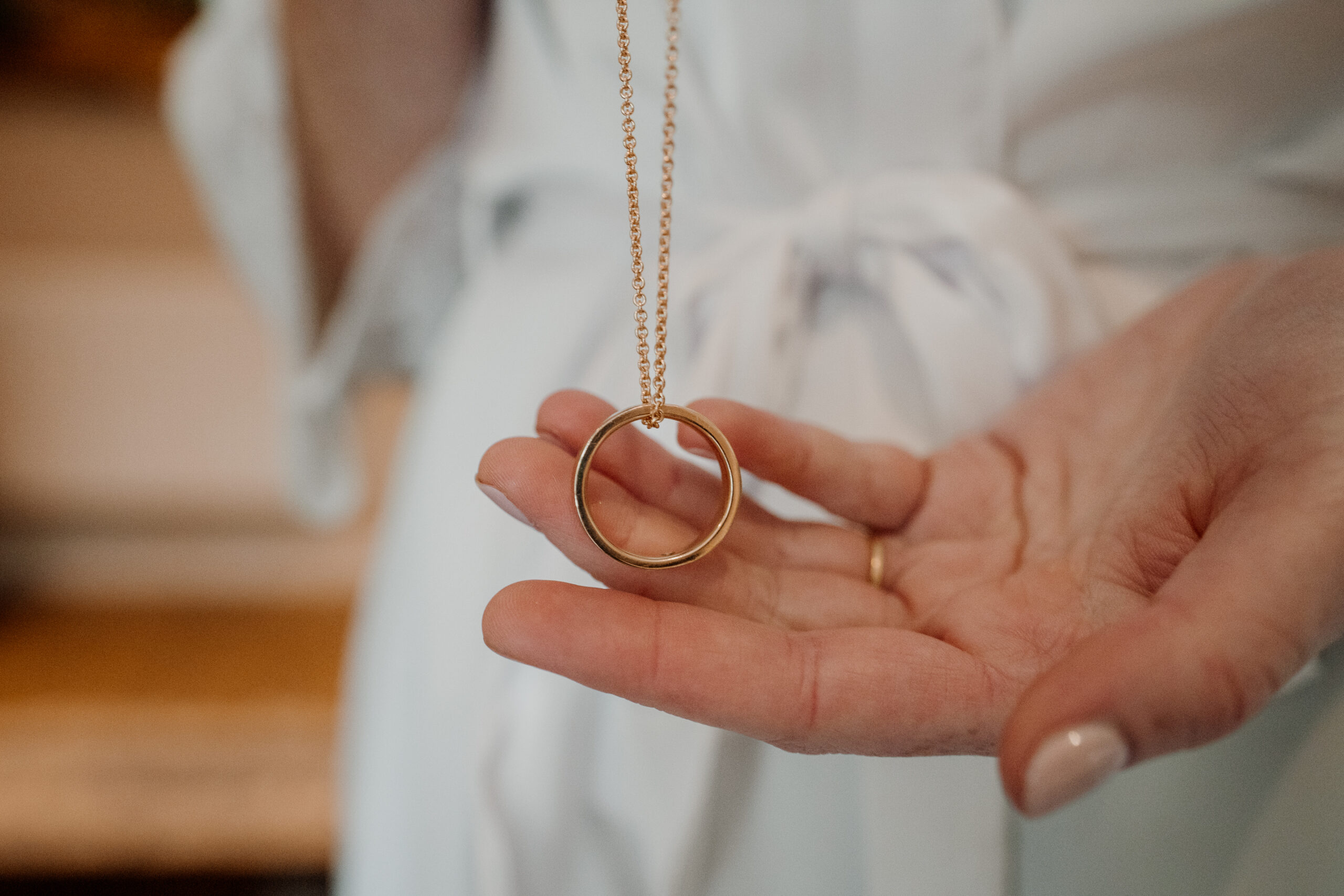 A person holding a key chain