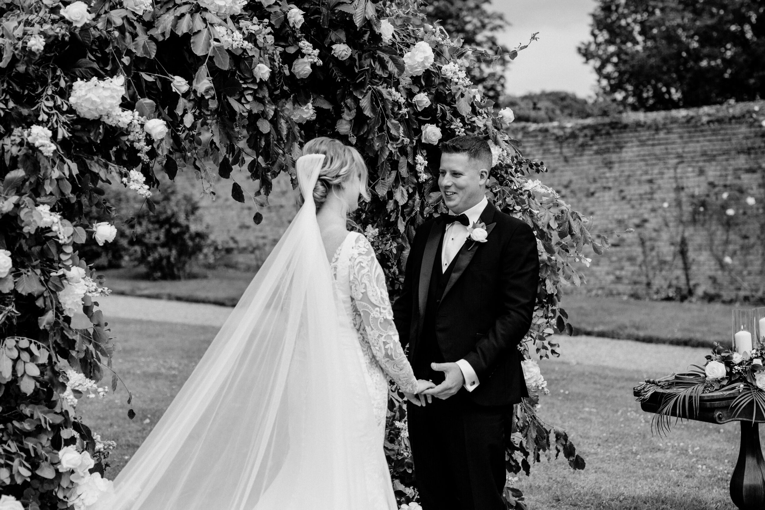 A bride and groom posing for a picture