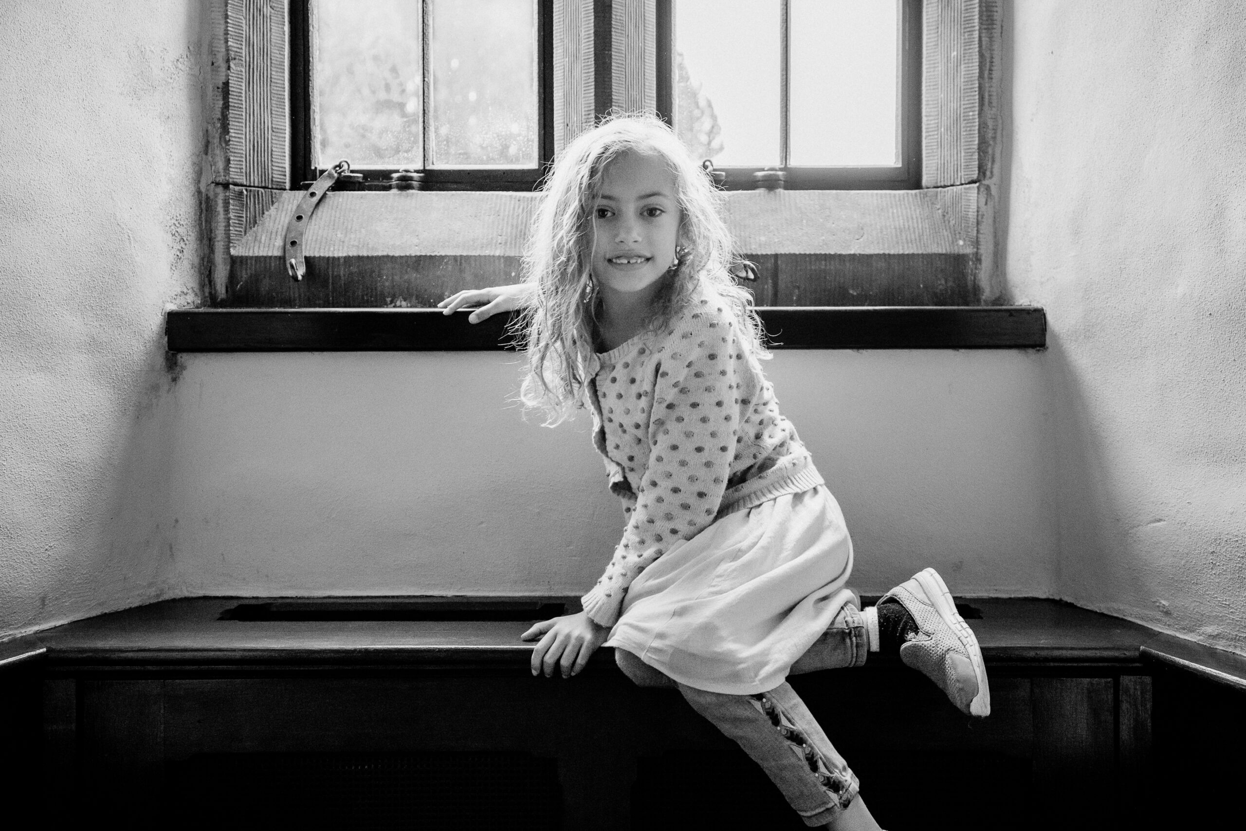 A person sitting on a counter