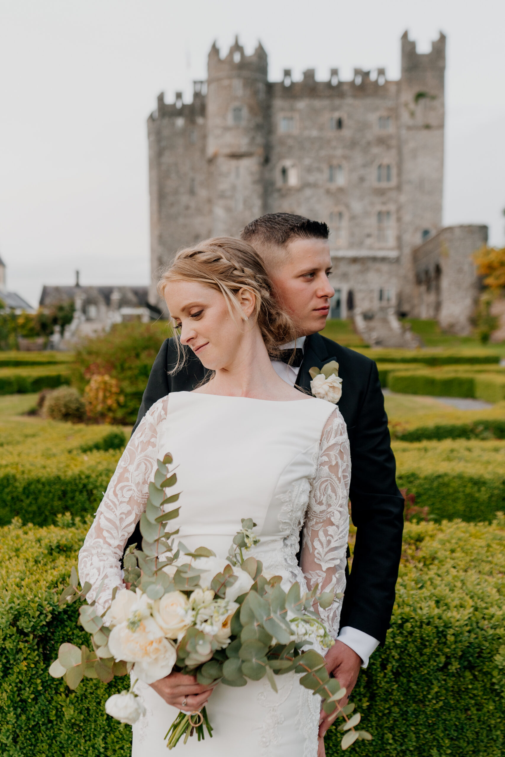 A man and woman in wedding attire