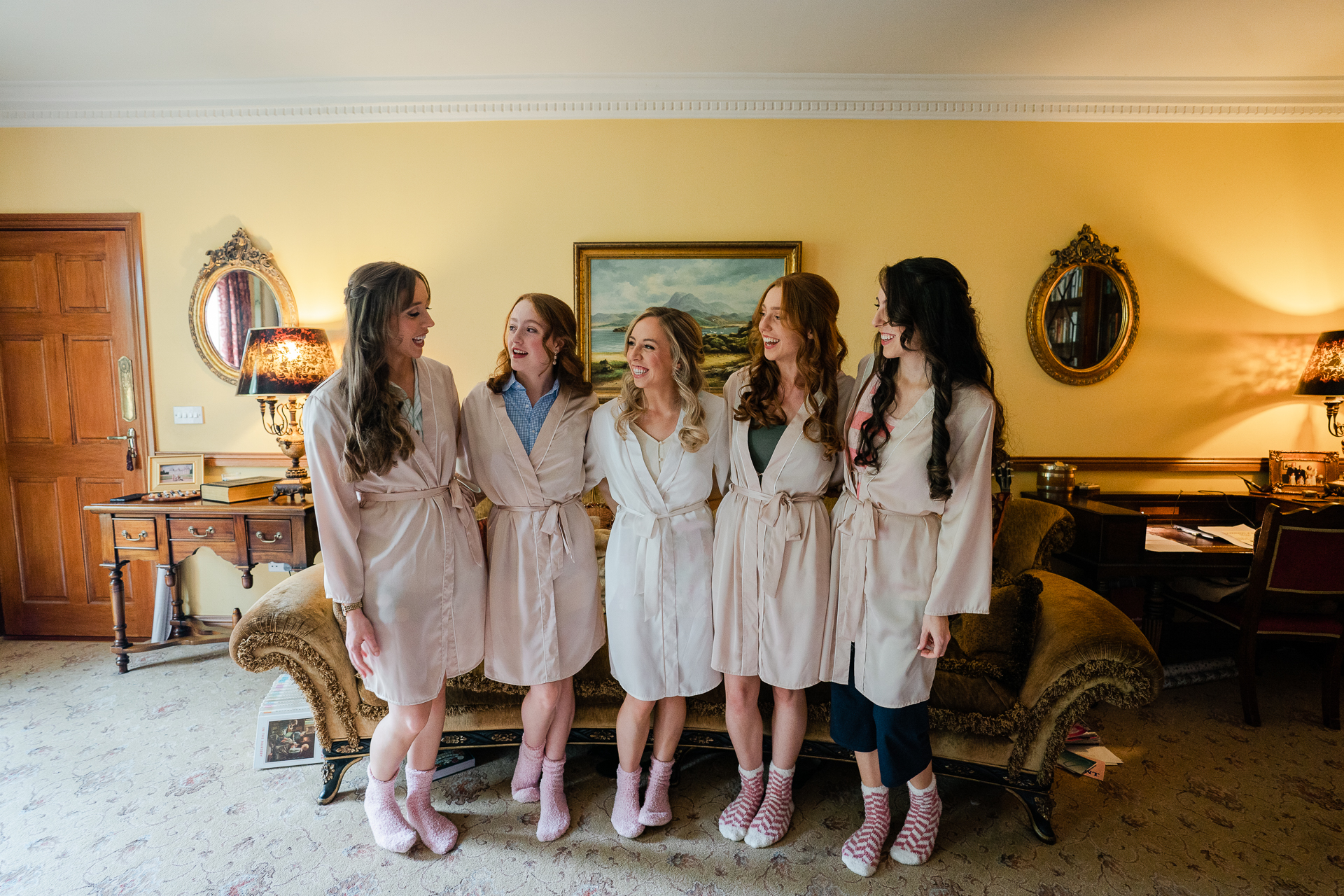 A group of women in white dresses