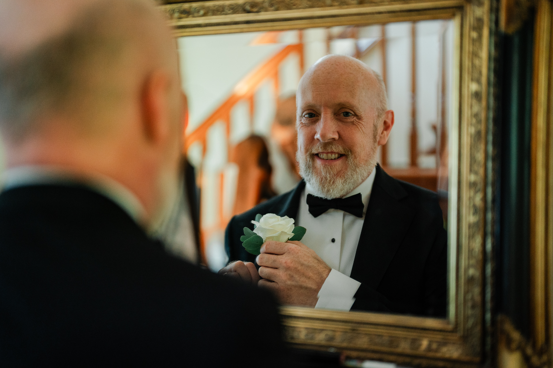 A man holding a flower