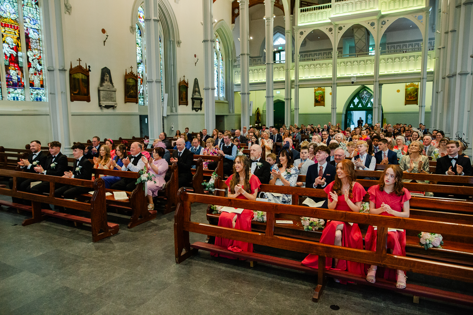 A group of people sitting in a church