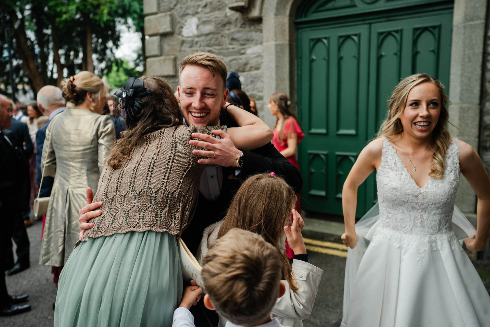 A man and woman dancing with a group of people