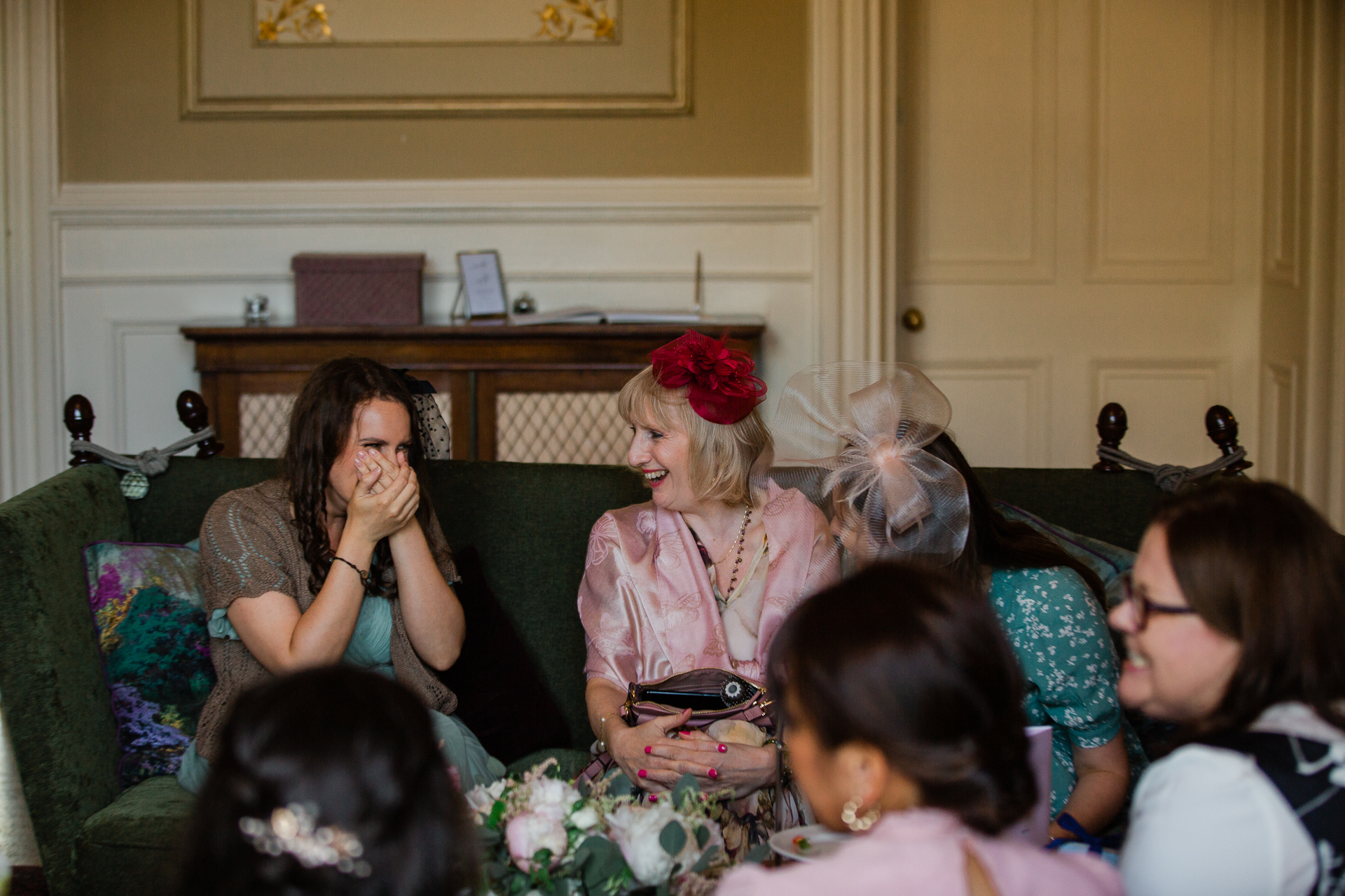 A group of women sitting on a couch