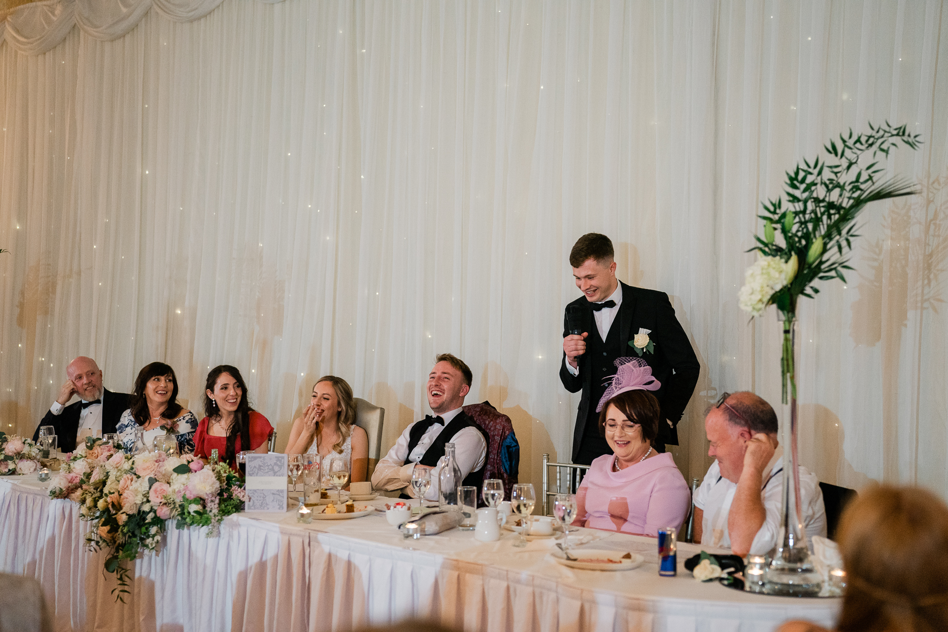 A group of people sitting at a table