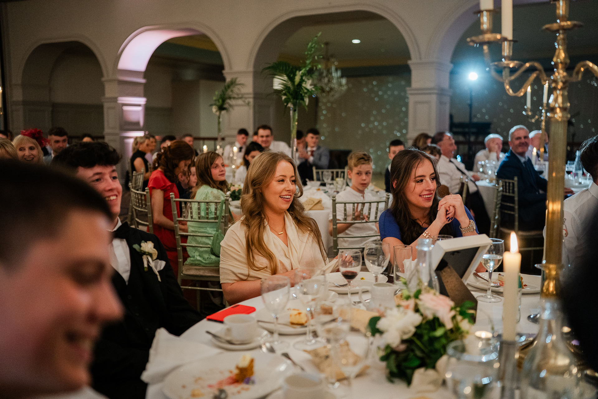 A group of people sitting at a table