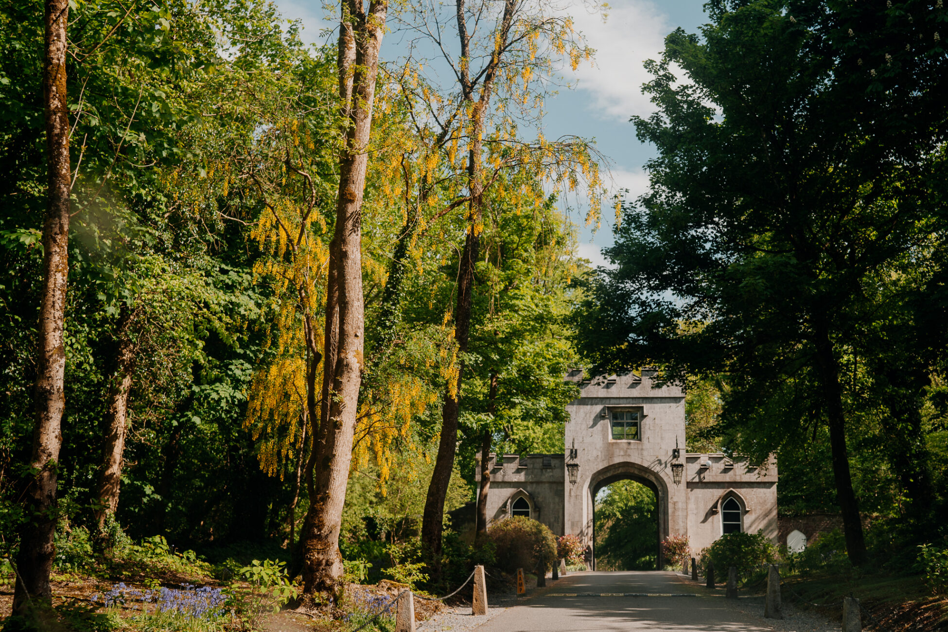 A stone building surrounded by trees