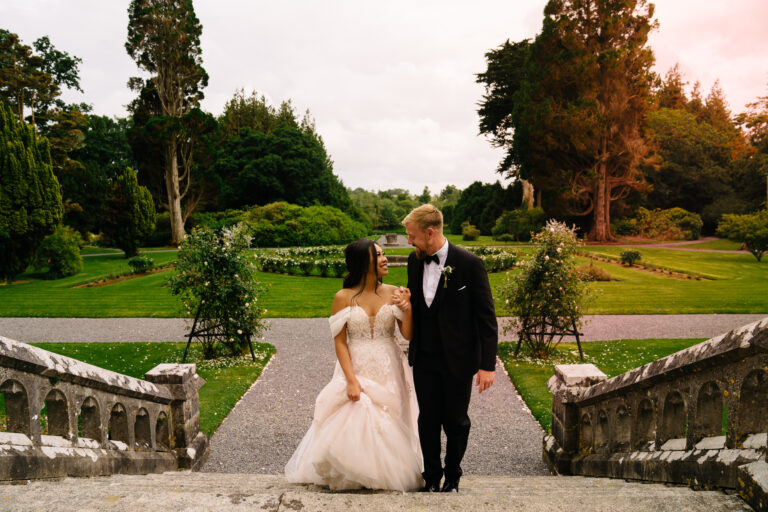 Bride and groom walking together through the garden path at Markree Castle, Sligo