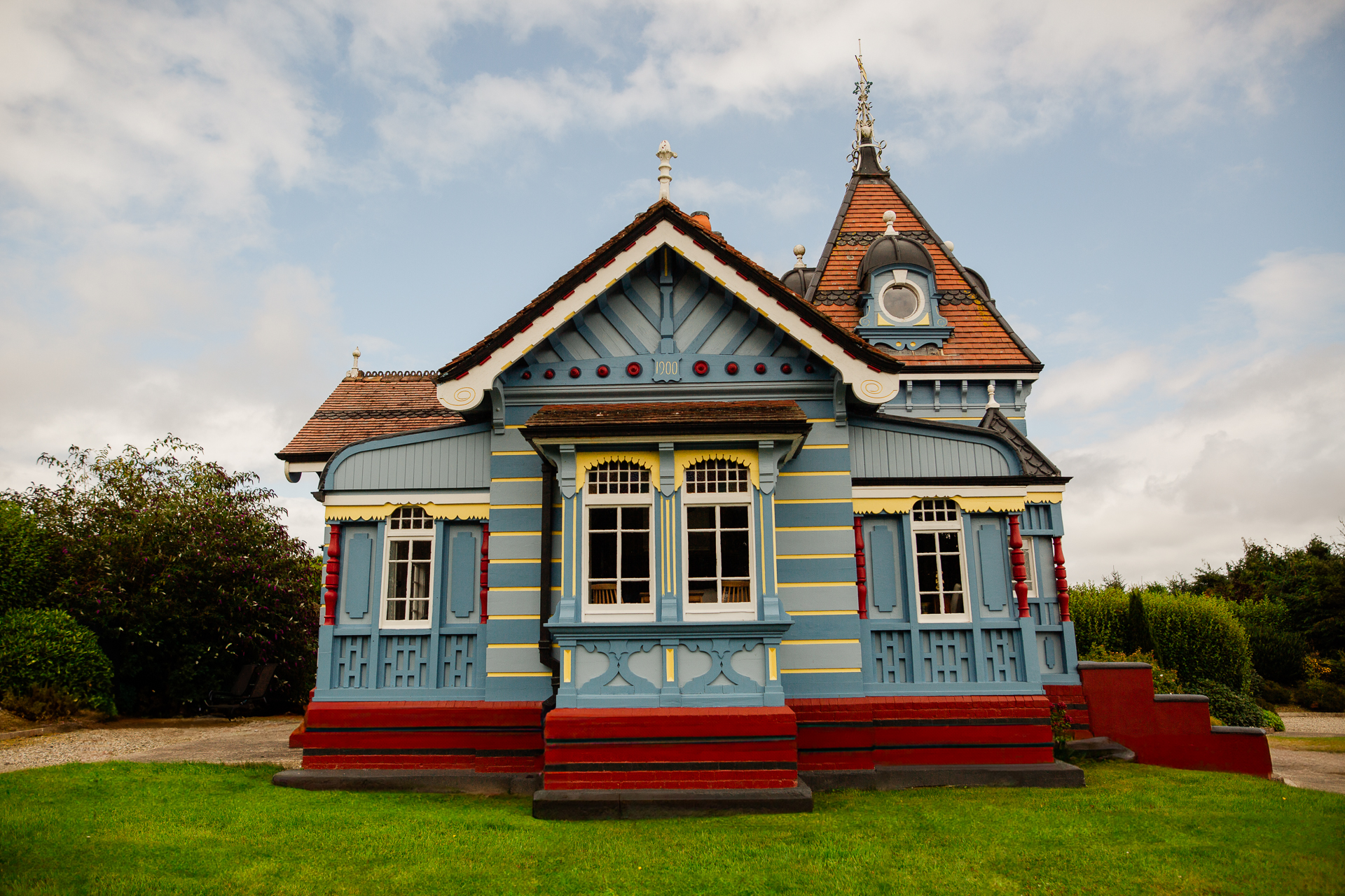 A small blue and white house