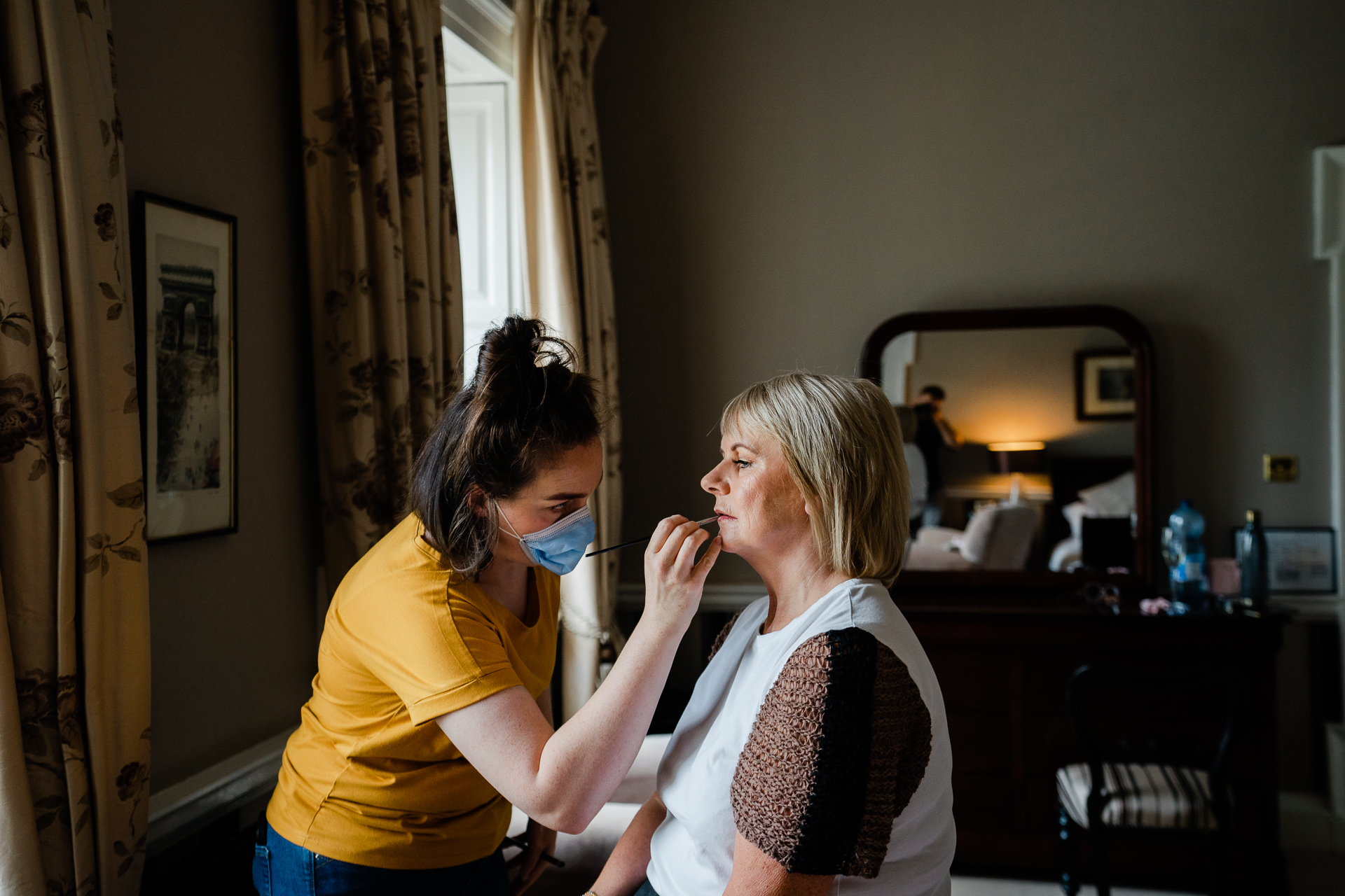 A woman getting her teeth brushed