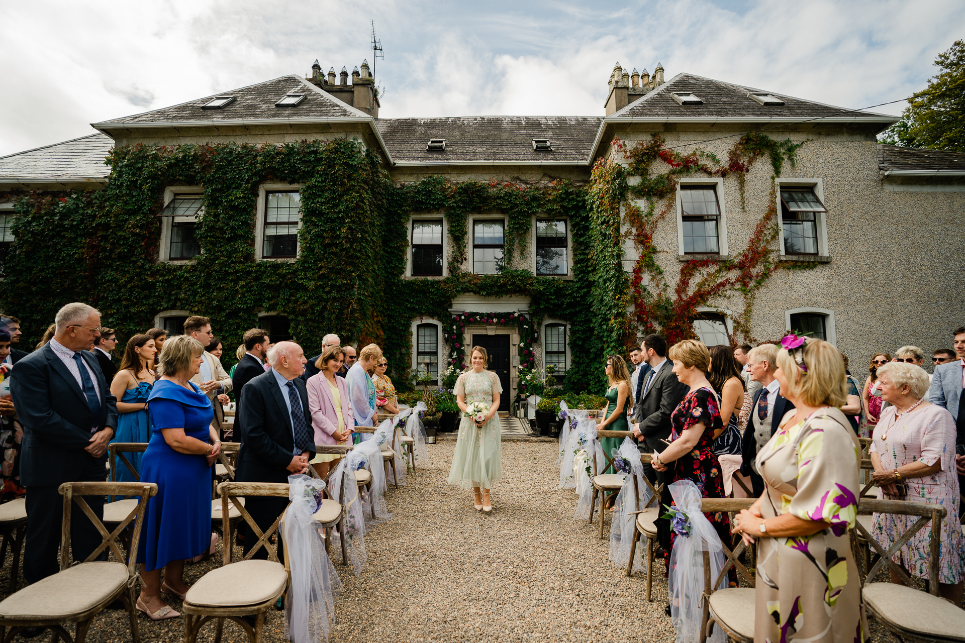 A wedding party in a backyard