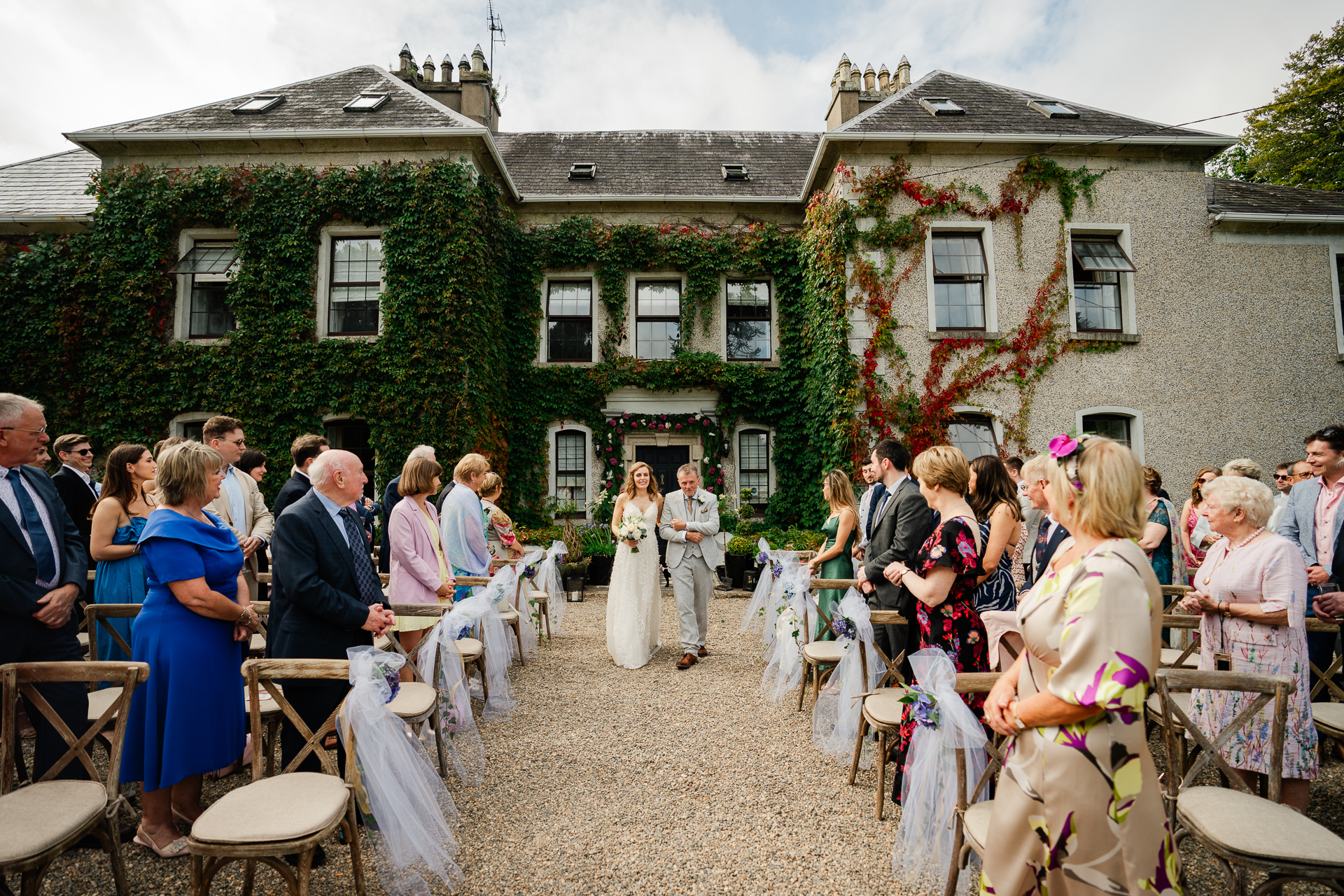 A wedding party in a backyard