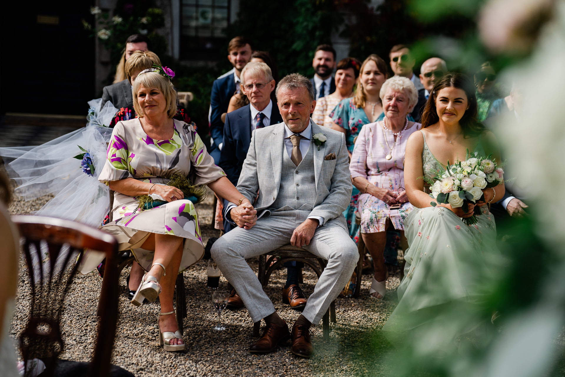 A group of people sitting in chairs