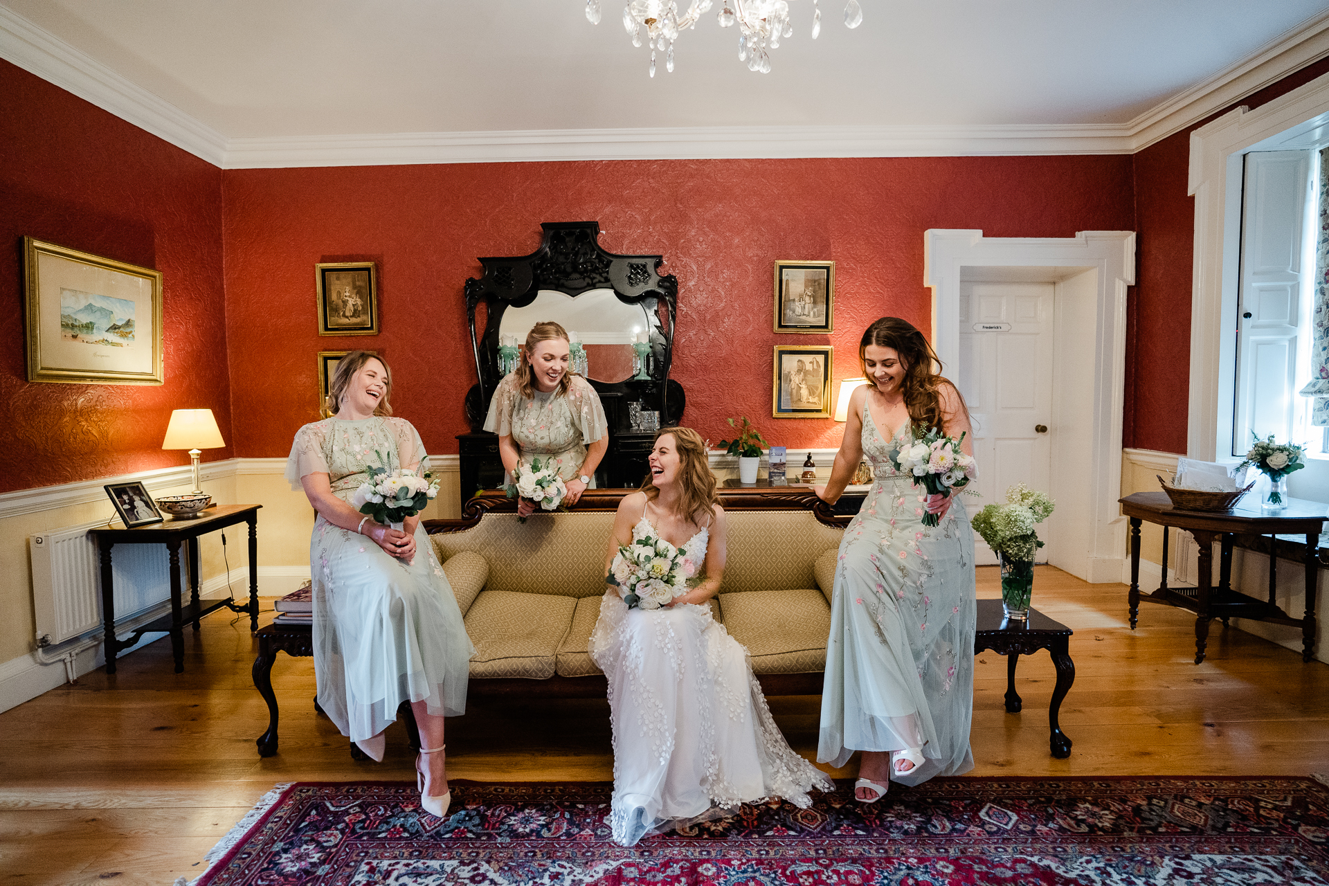 A group of women in white dresses