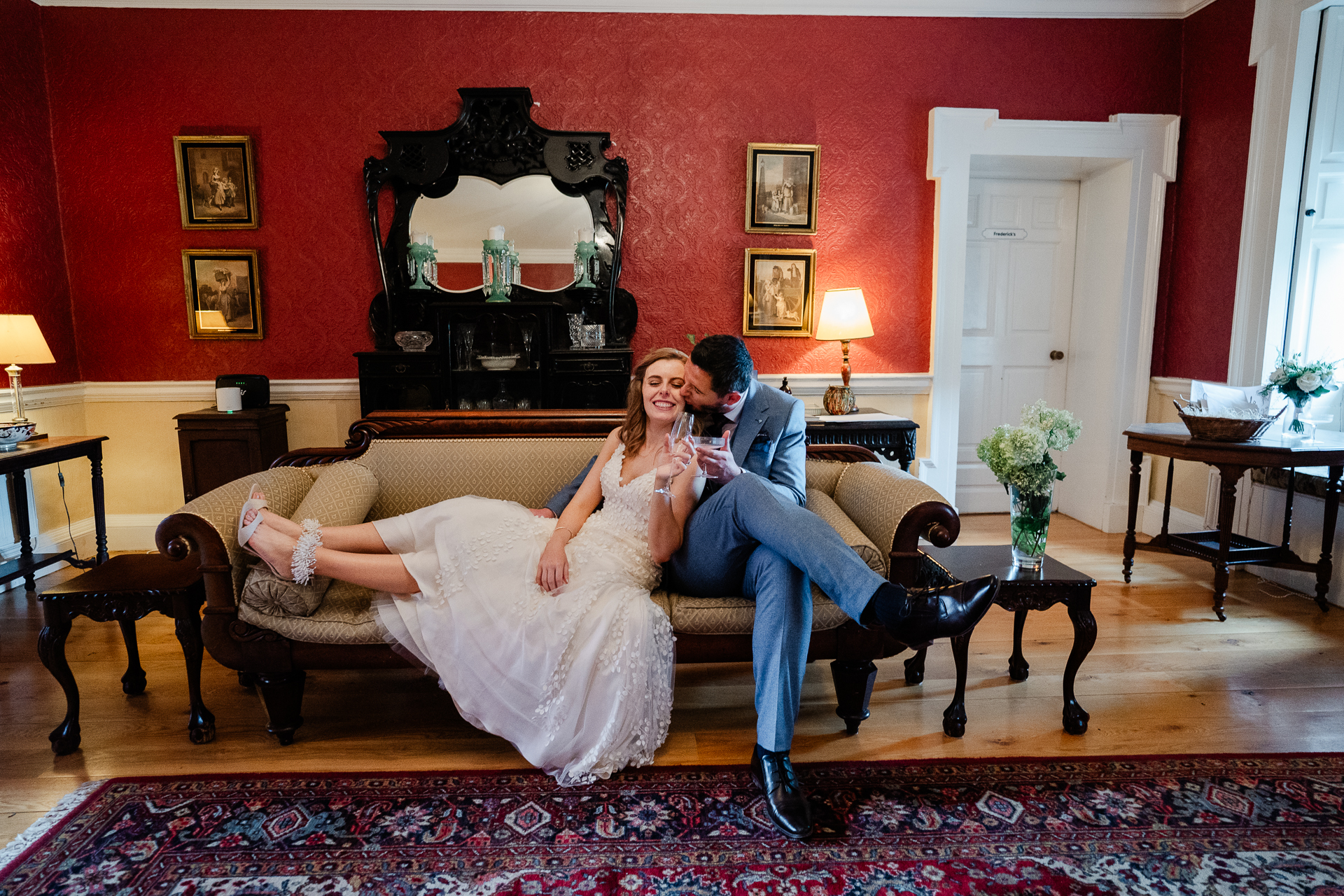 A man and woman sitting on a couch